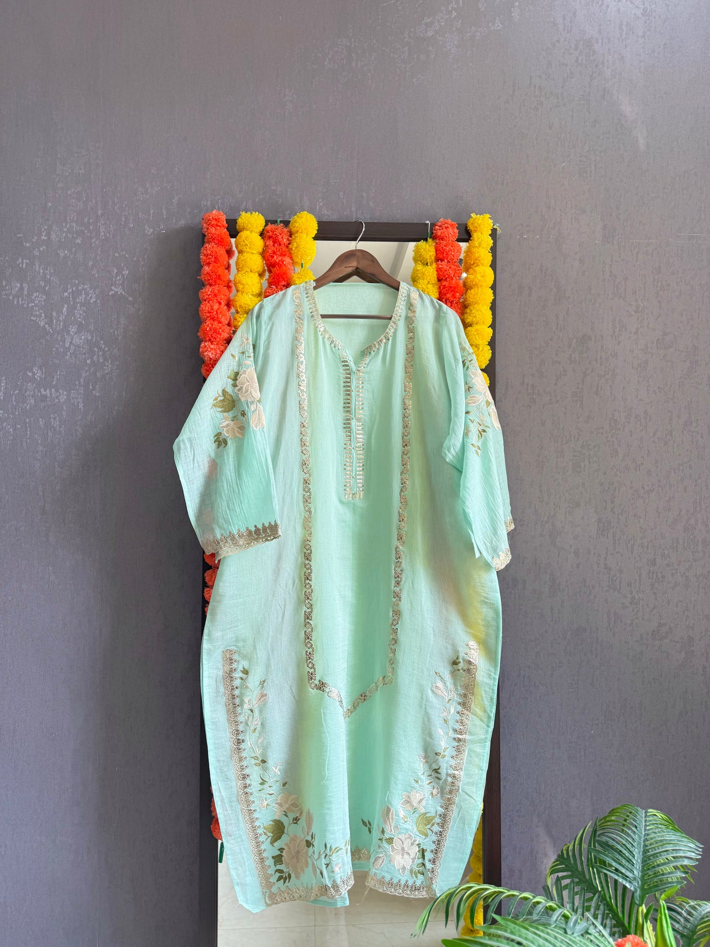 Luxurious Mul chanderi gold appliqué work suit