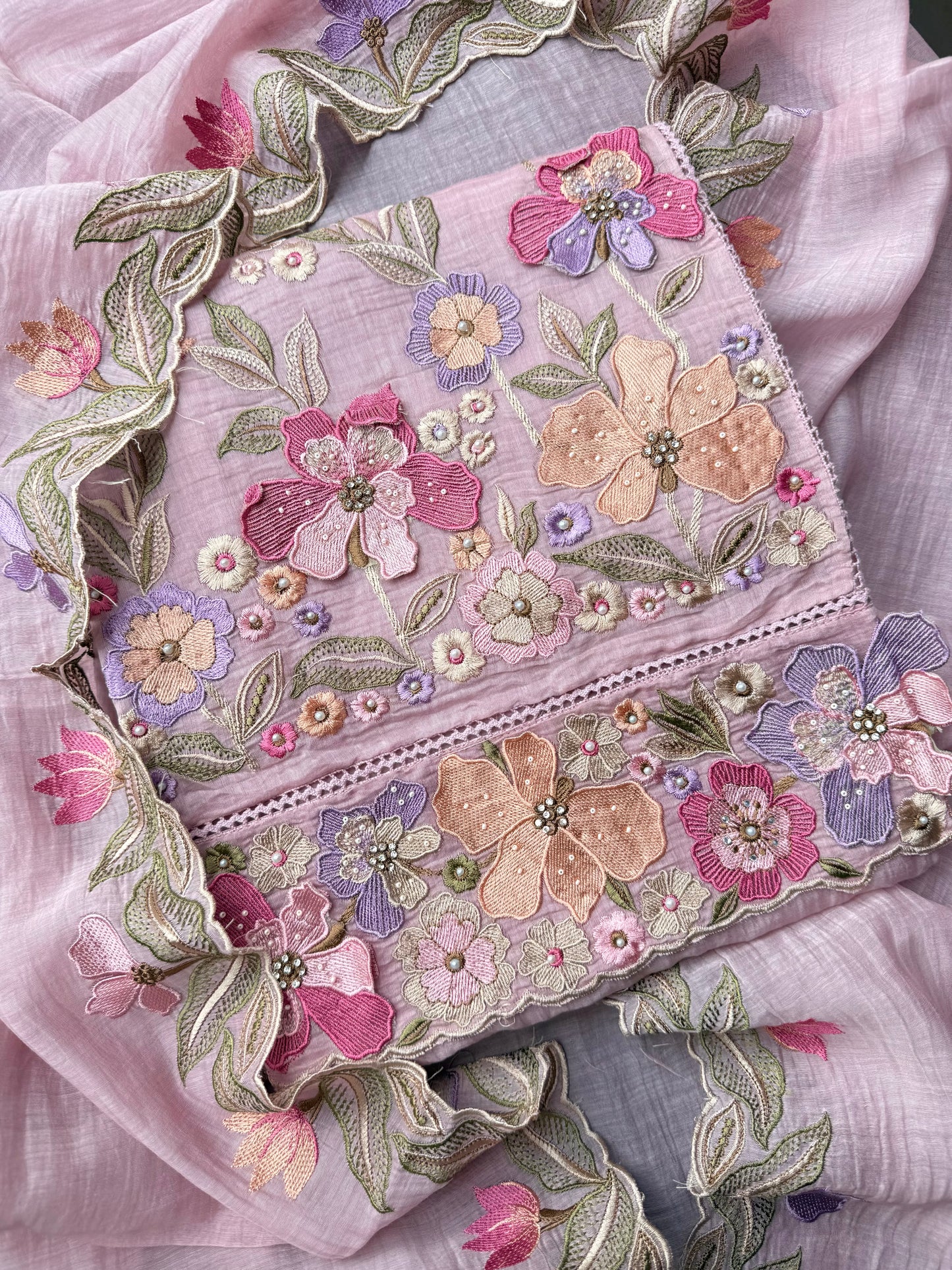 Luxurious Mul chanderi appliqué work floral suit