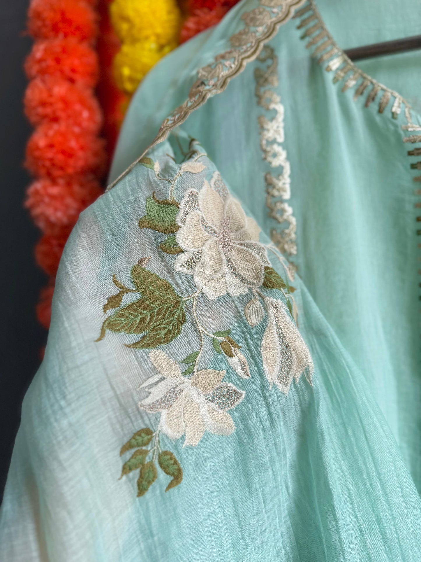 Luxurious Mul chanderi gold appliqué work suit