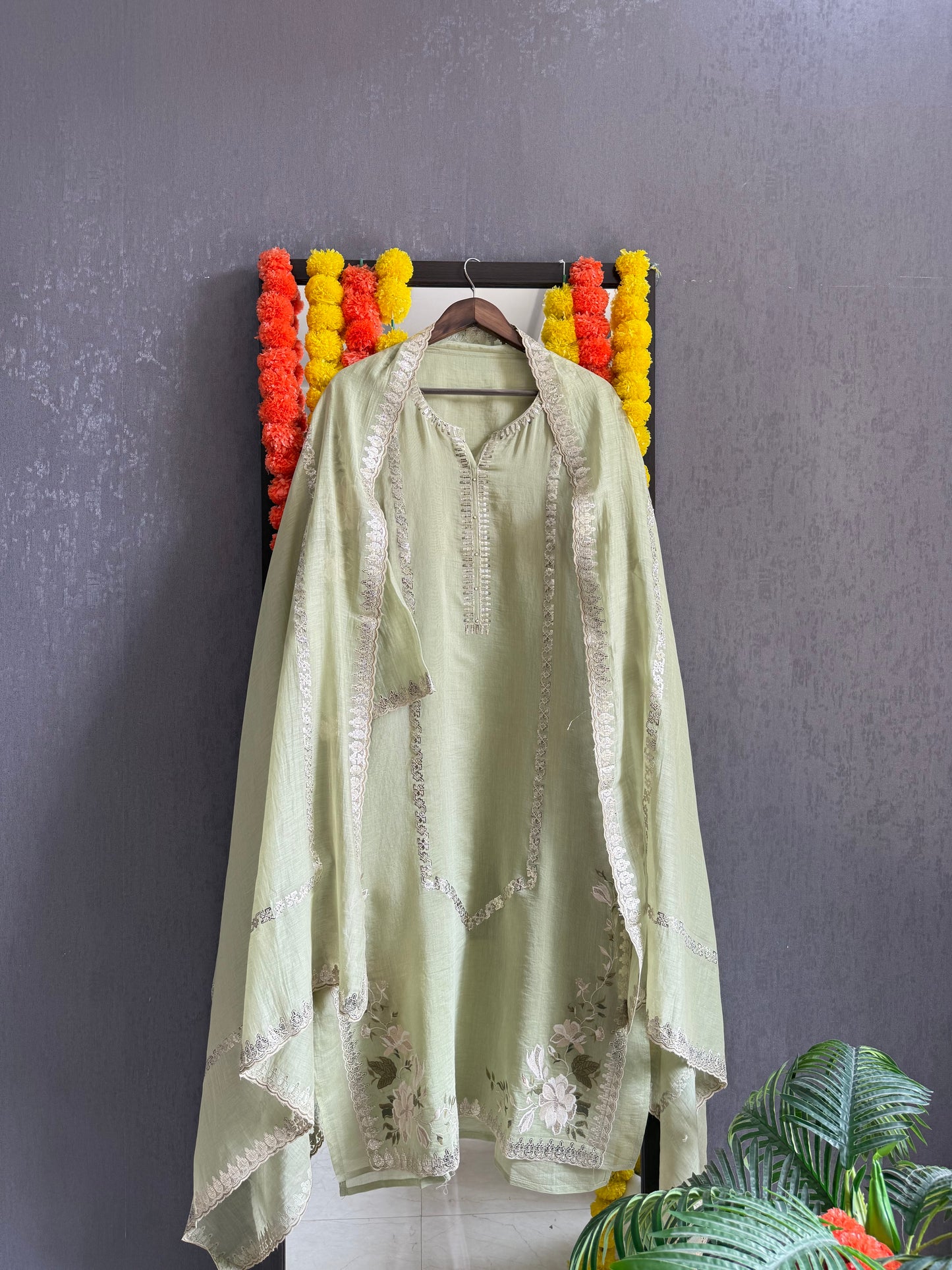 Luxurious Mul chanderi gold appliqué work suit