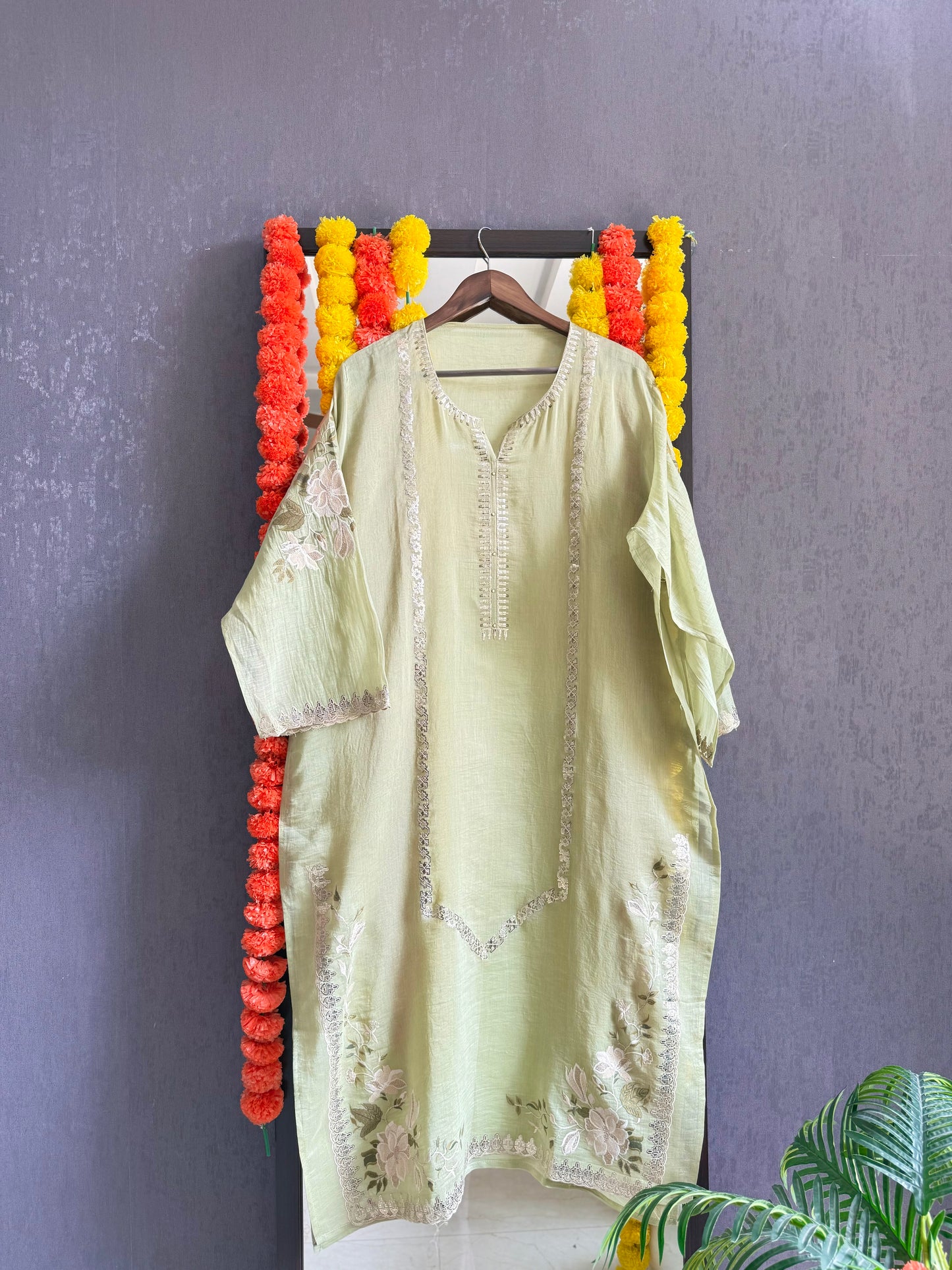 Luxurious Mul chanderi gold appliqué work suit