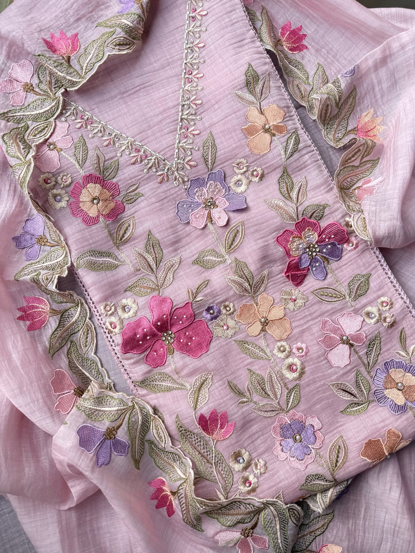 Luxurious Mul chanderi appliqué work floral suit