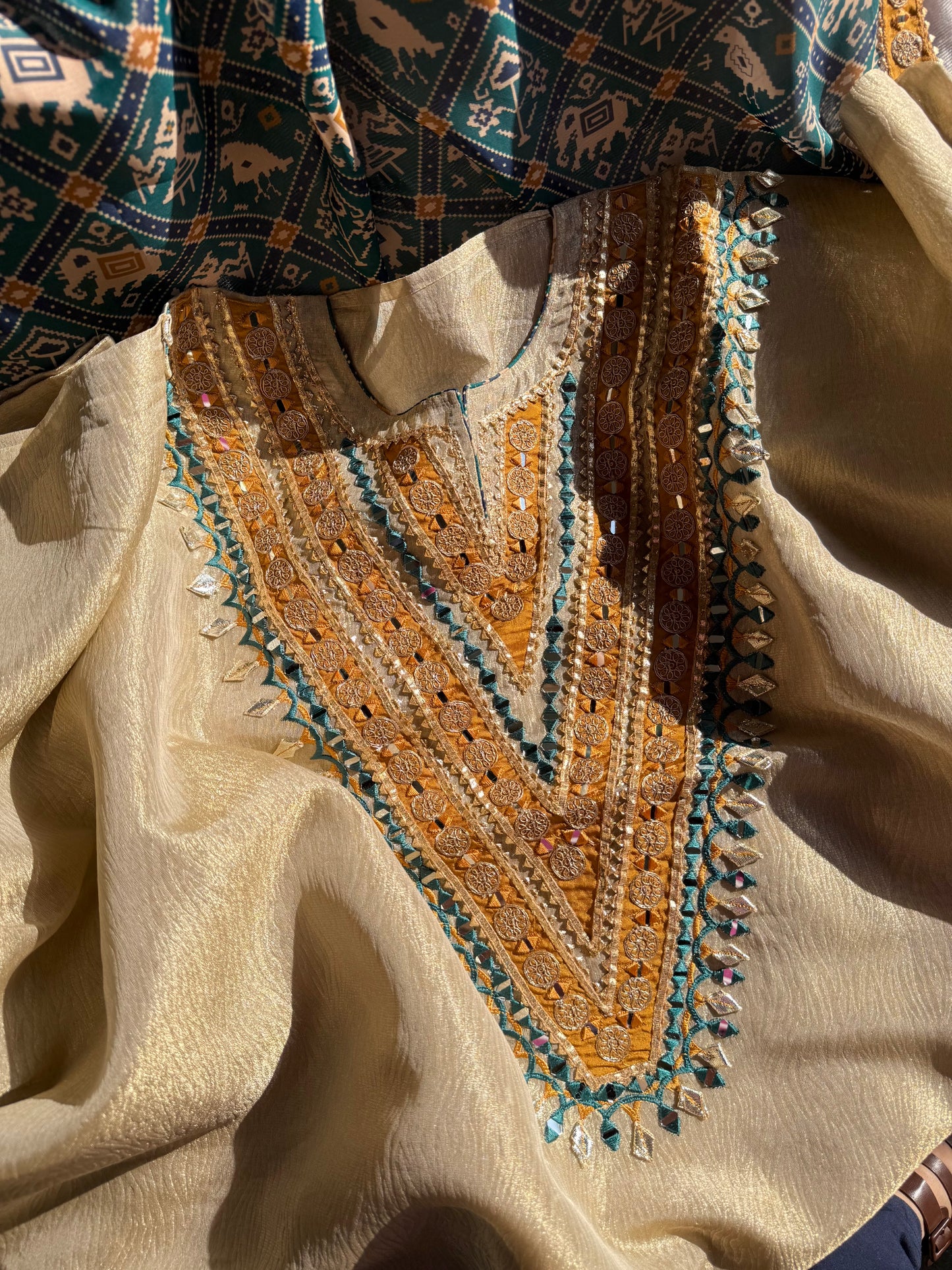Luxurious patola crush tissue silk suit