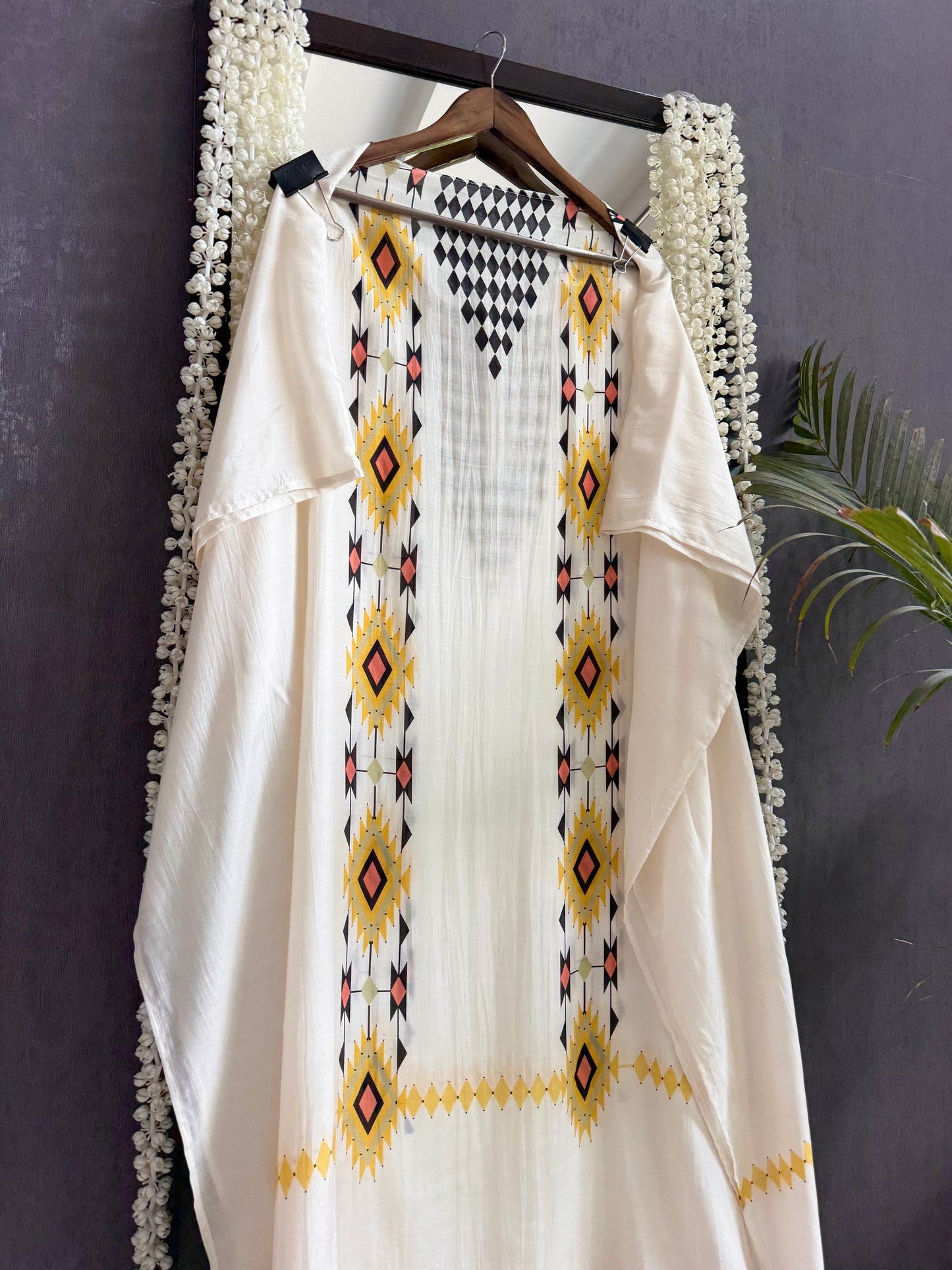 Muslin ikkat inspired handwork suits