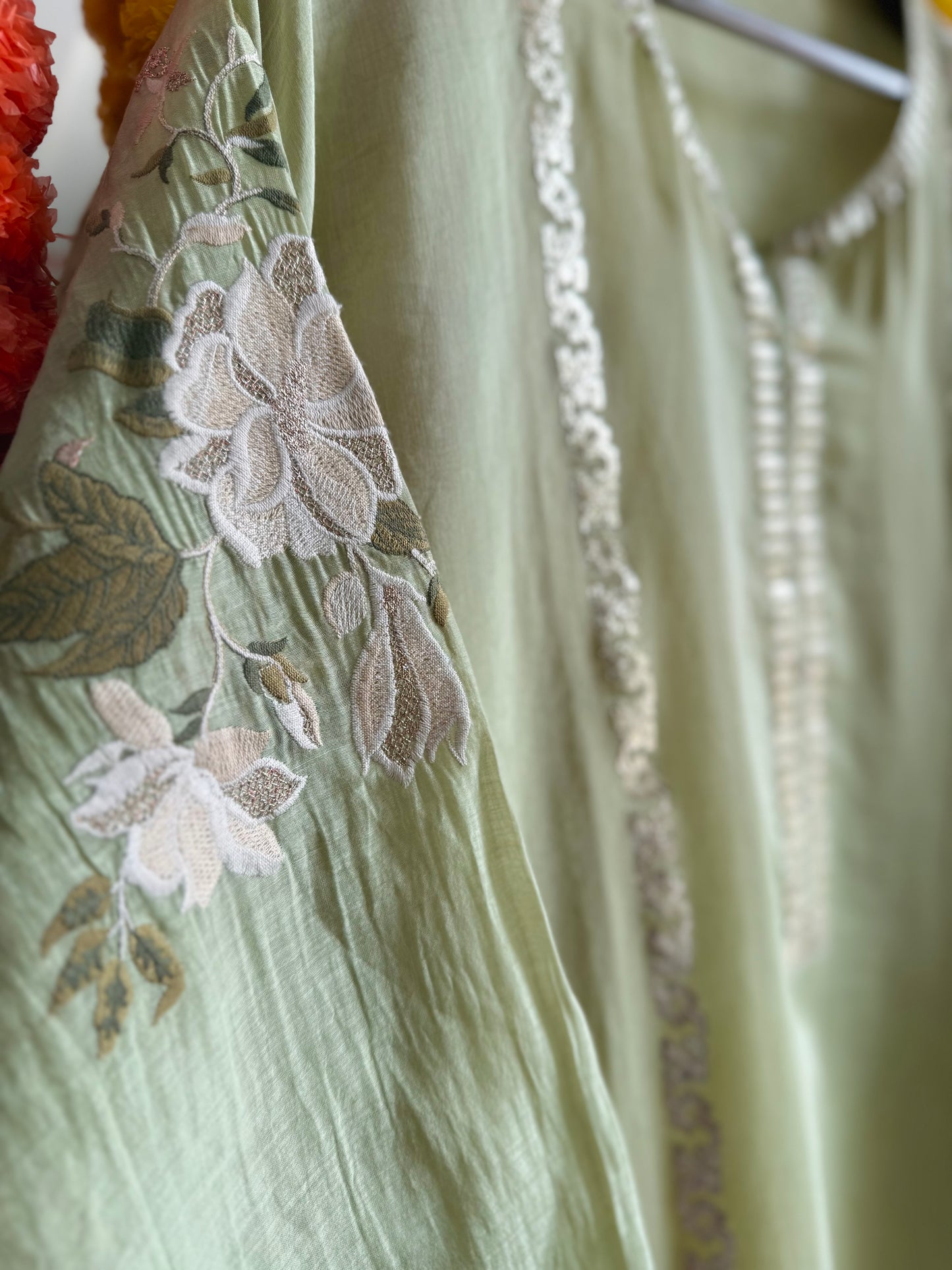 Luxurious Mul chanderi gold appliqué work suit
