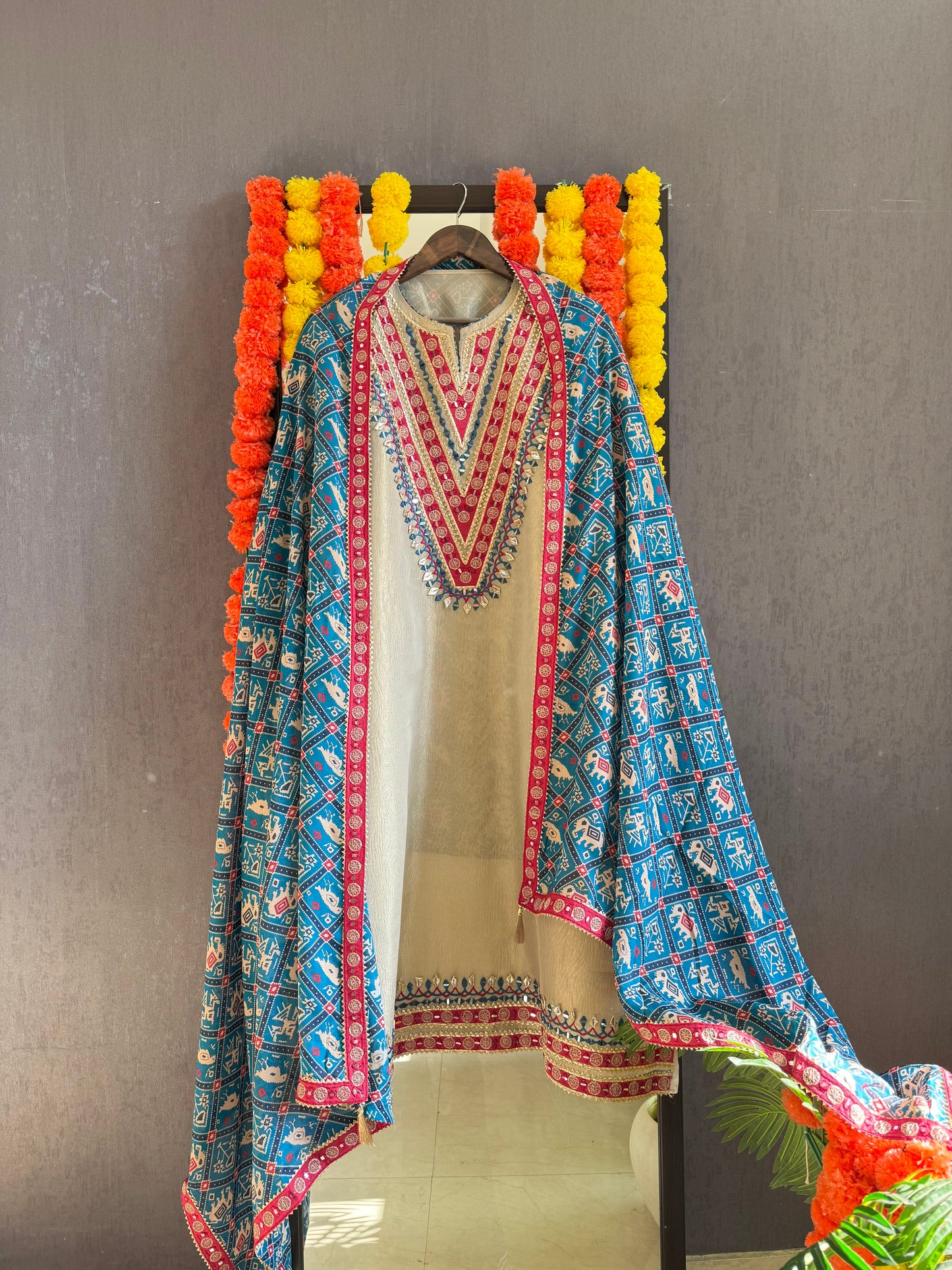 Luxurious patola crush tissue silk suit