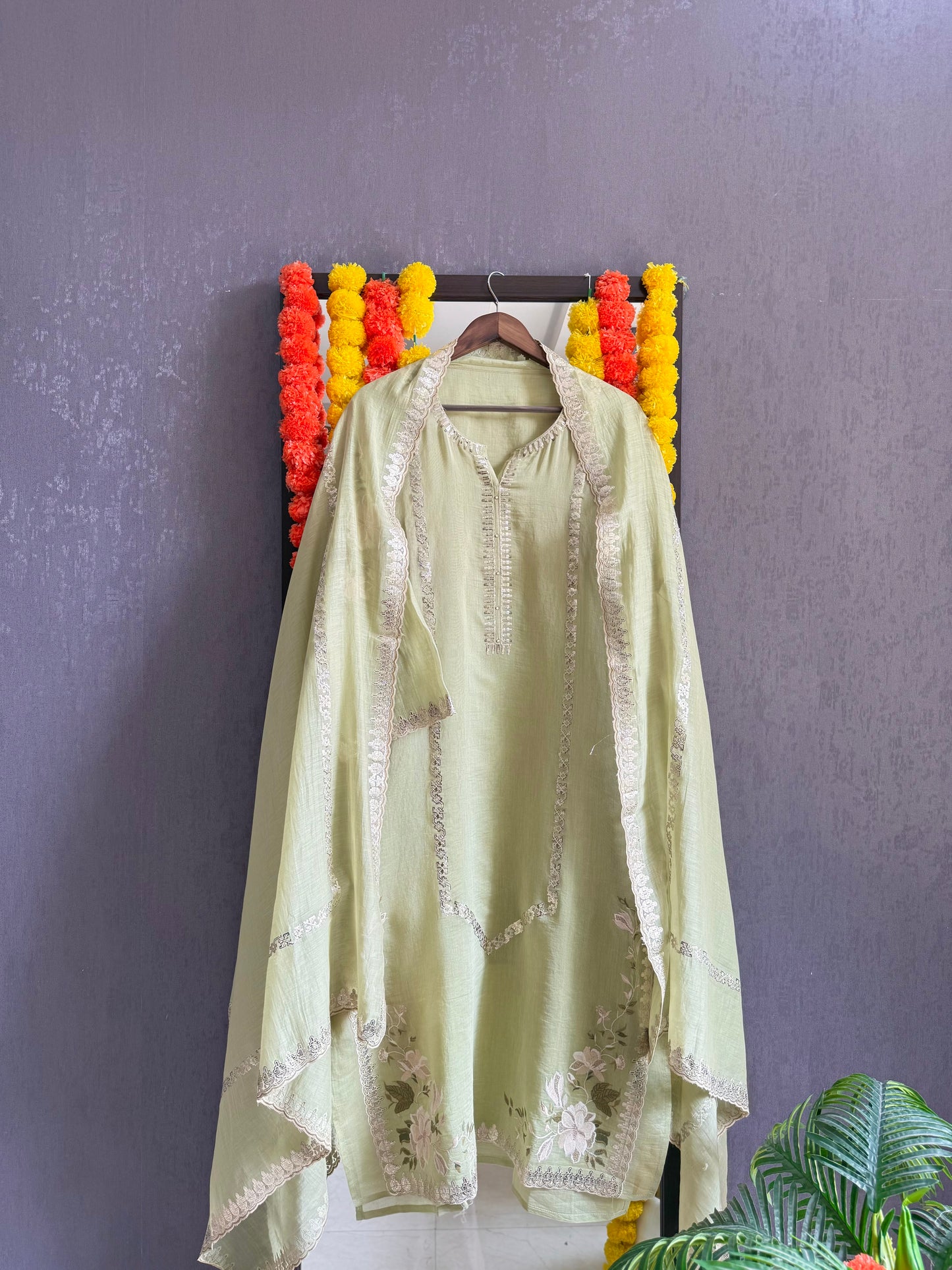 Luxurious Mul chanderi gold appliqué work suit