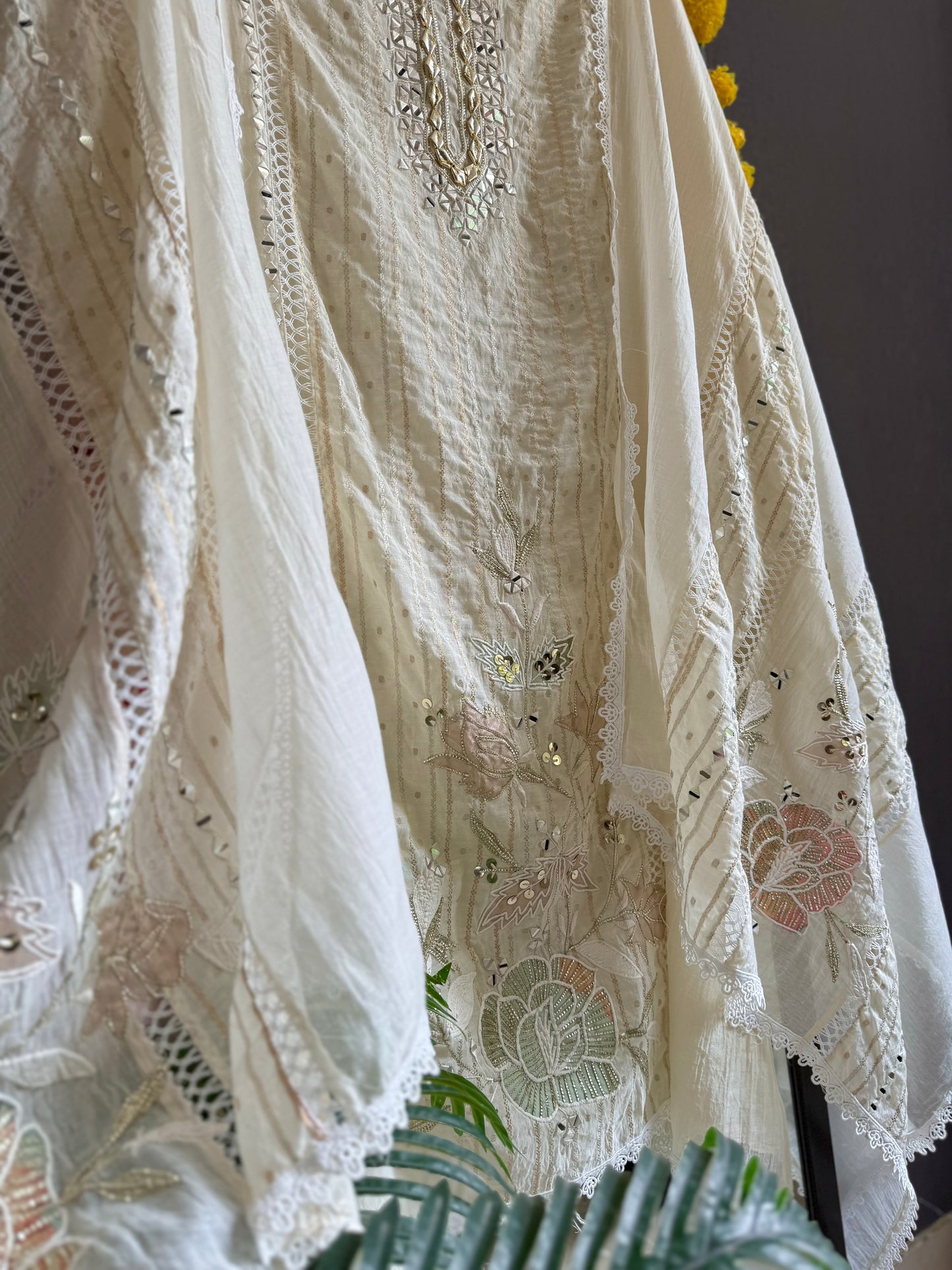 Luxurious Mul chanderi gold appliqué work suit