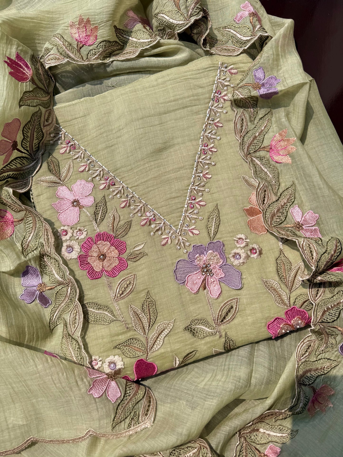 Luxurious Mul chanderi appliqué work floral suit