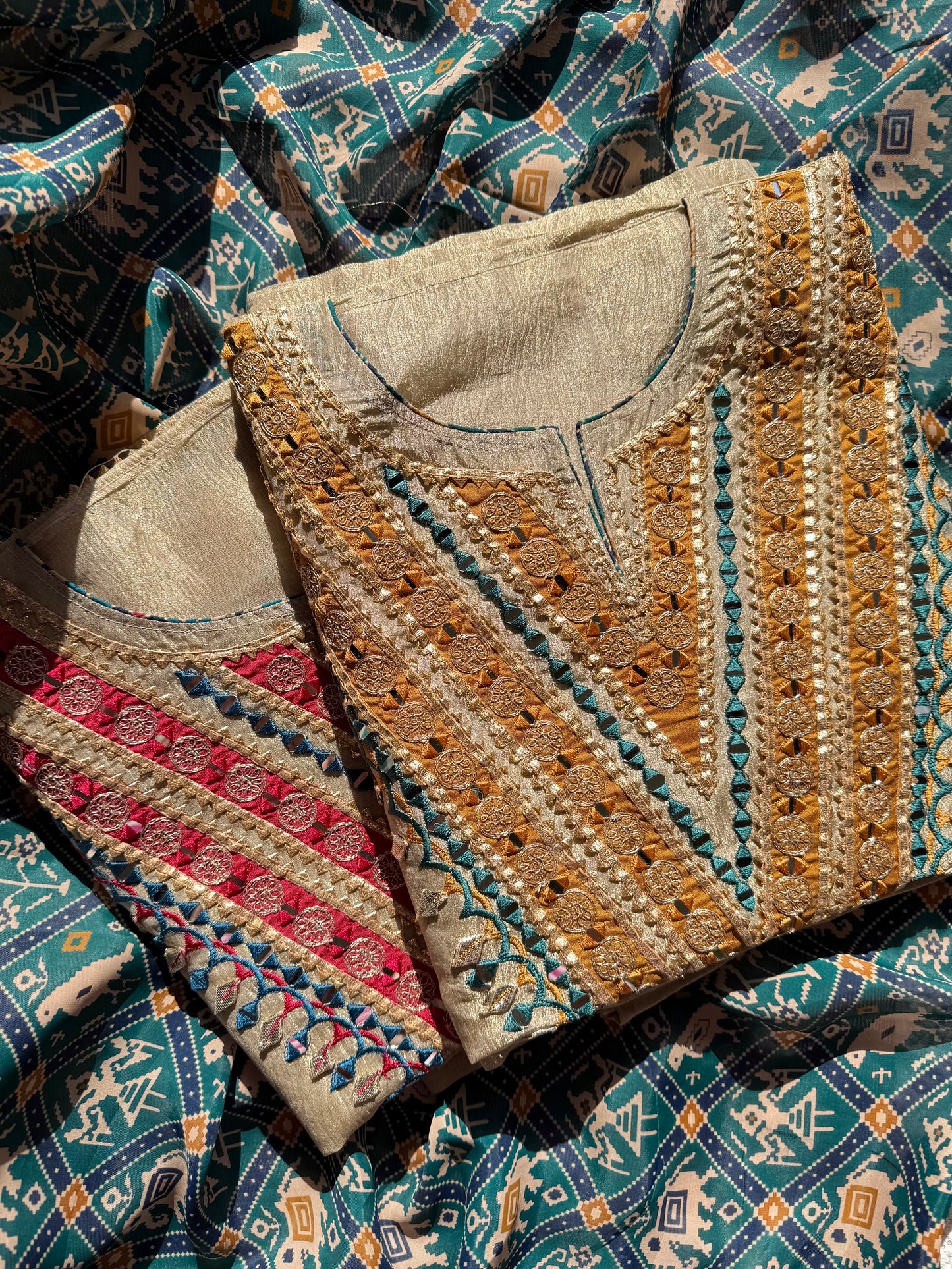 Luxurious patola crush tissue silk suit