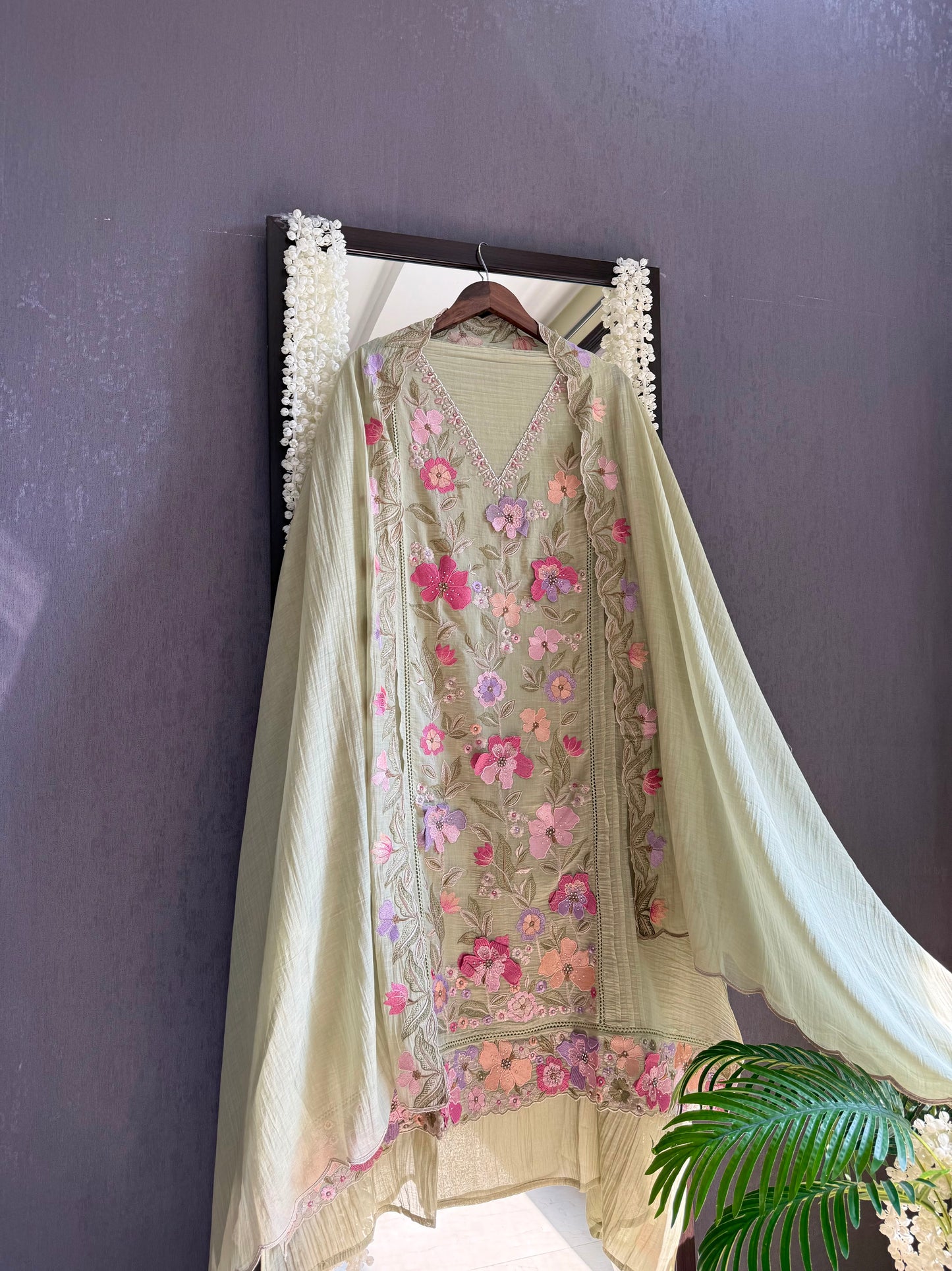 Luxurious Mul chanderi appliqué work floral suit