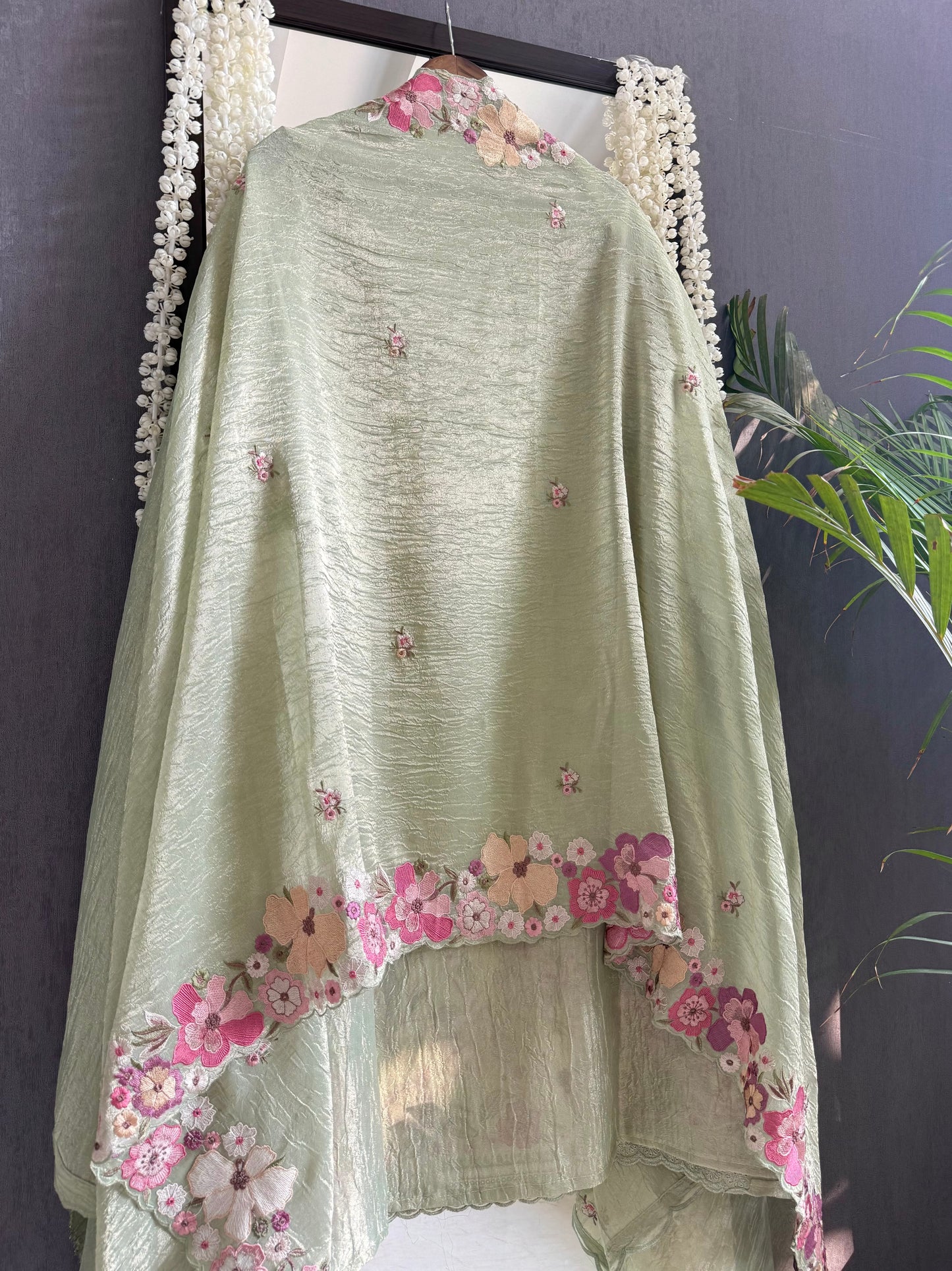 Luxurious Mul chanderi appliqué work floral suit
