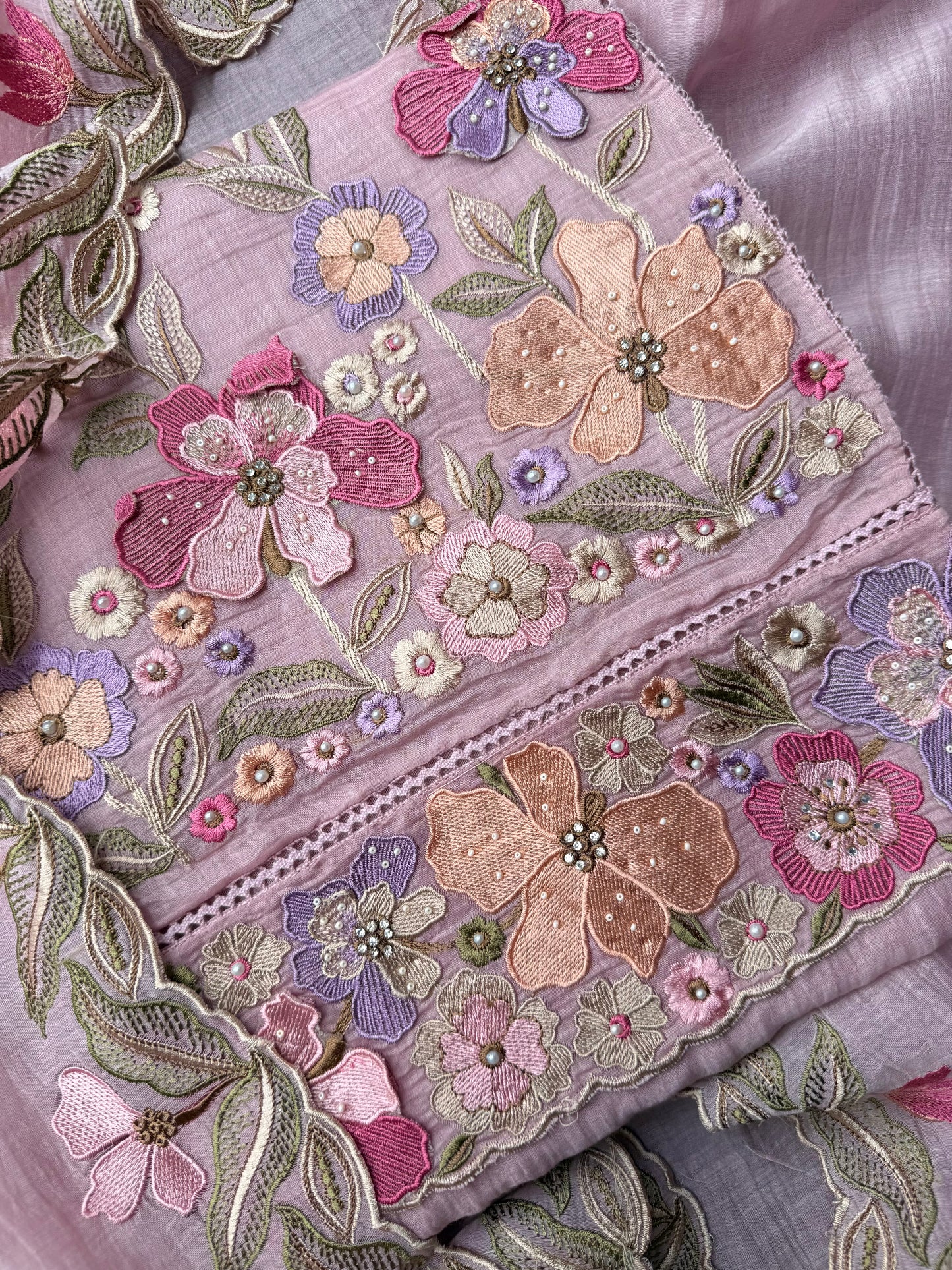 Luxurious Mul chanderi appliqué work floral suit