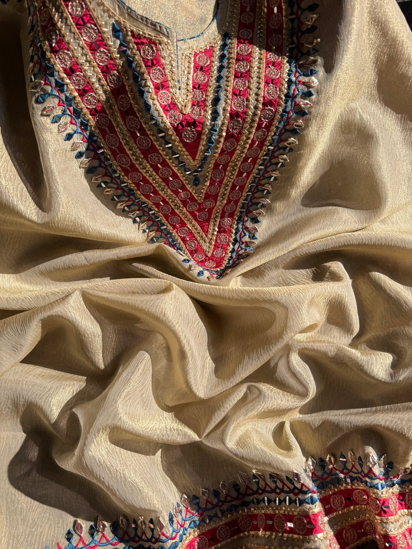 Luxurious patola crush tissue silk suit