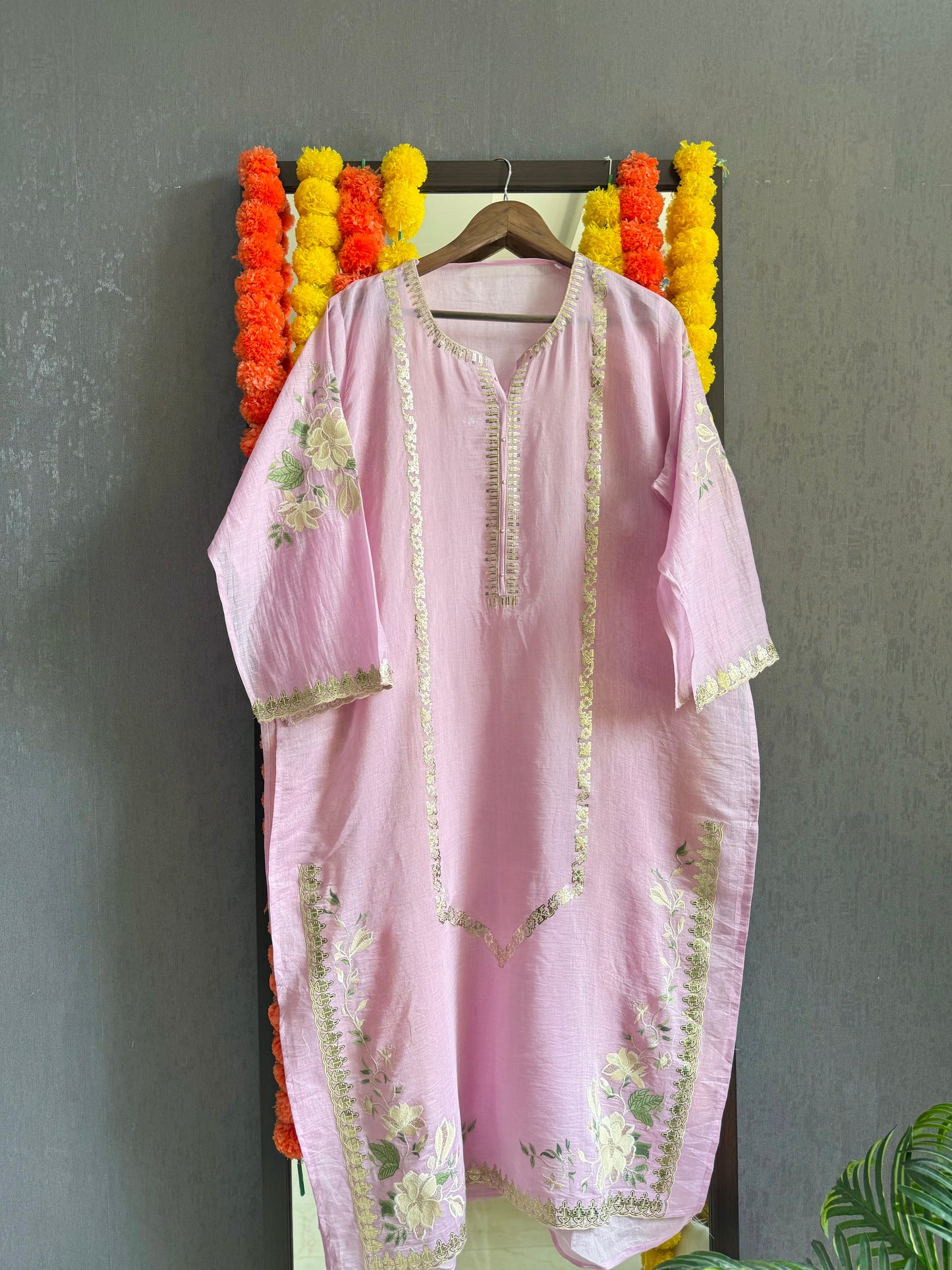 Luxurious Mul chanderi gold appliqué work suit