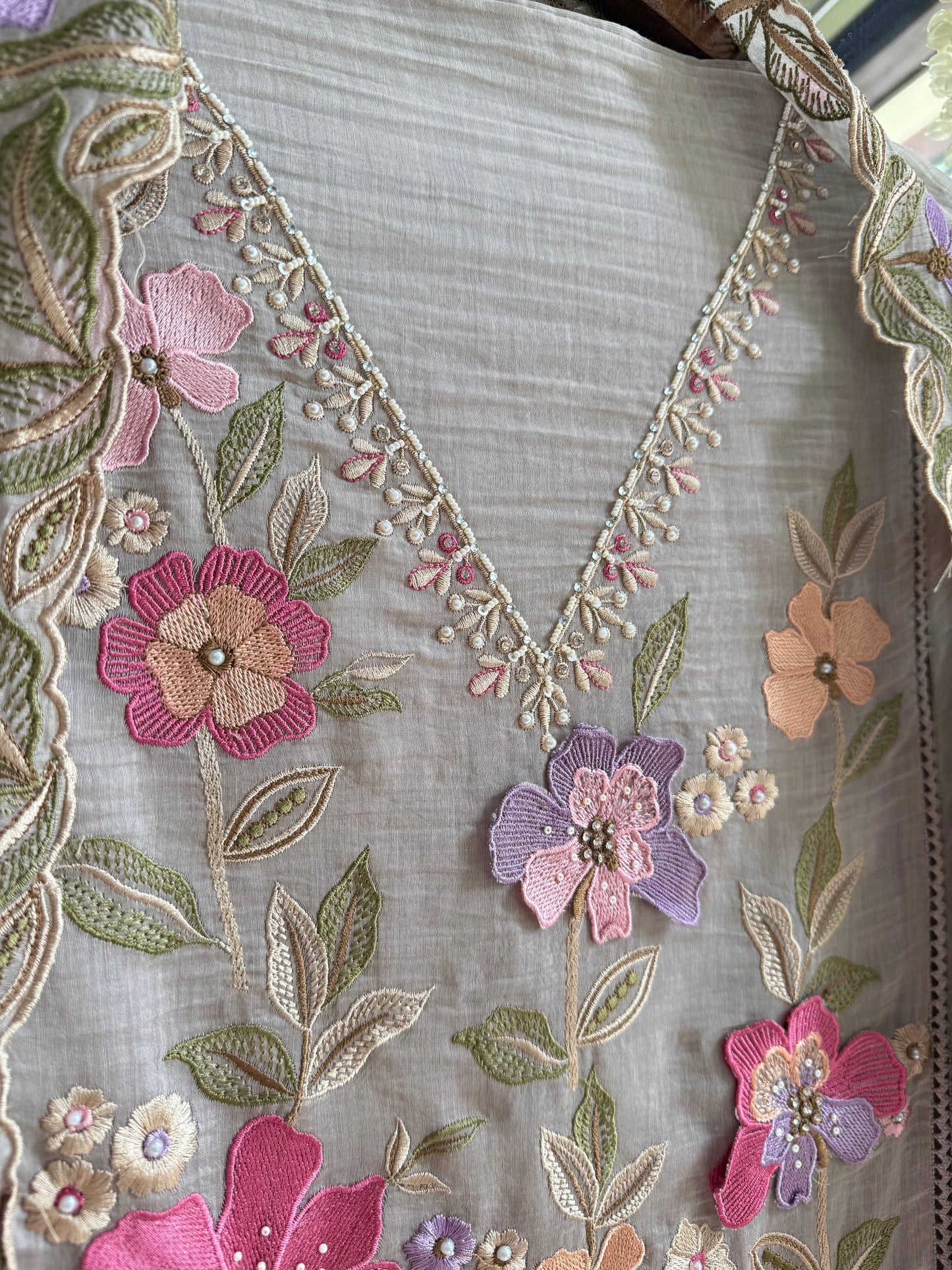 Luxurious Mul chanderi appliqué work floral suit