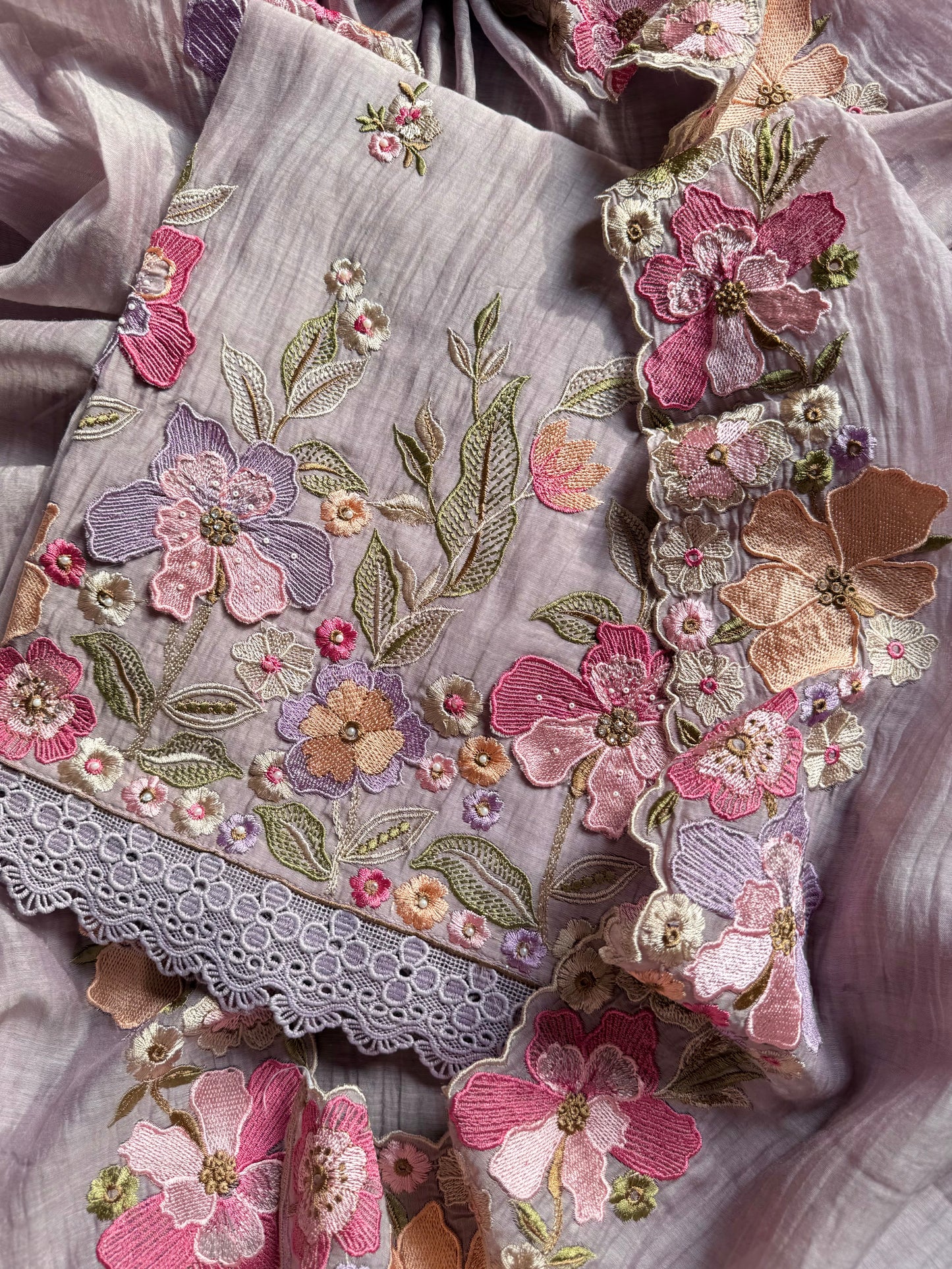 Luxurious Mul chanderi appliqué work floral suit