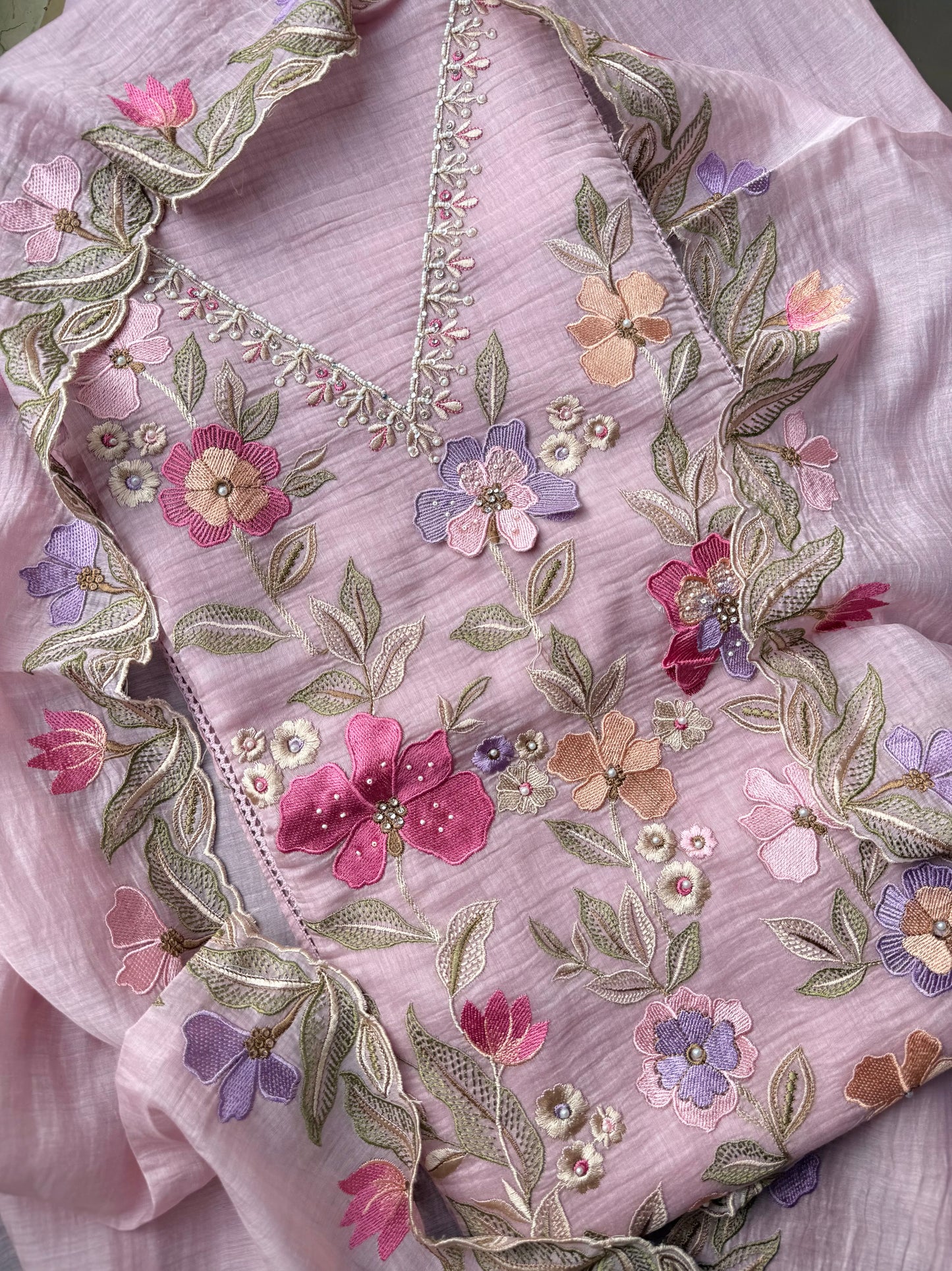 Luxurious Mul chanderi appliqué work floral suit