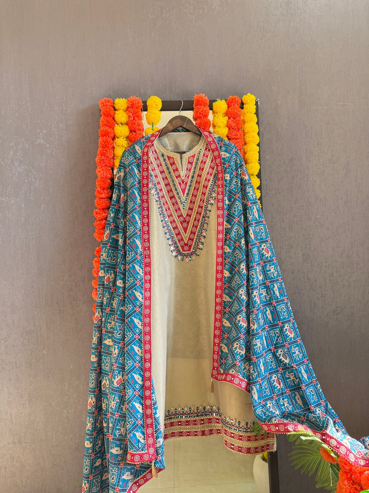 Luxurious patola crush tissue silk suit