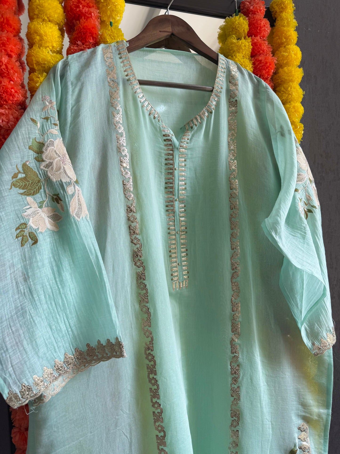 Luxurious Mul chanderi gold appliqué work suit