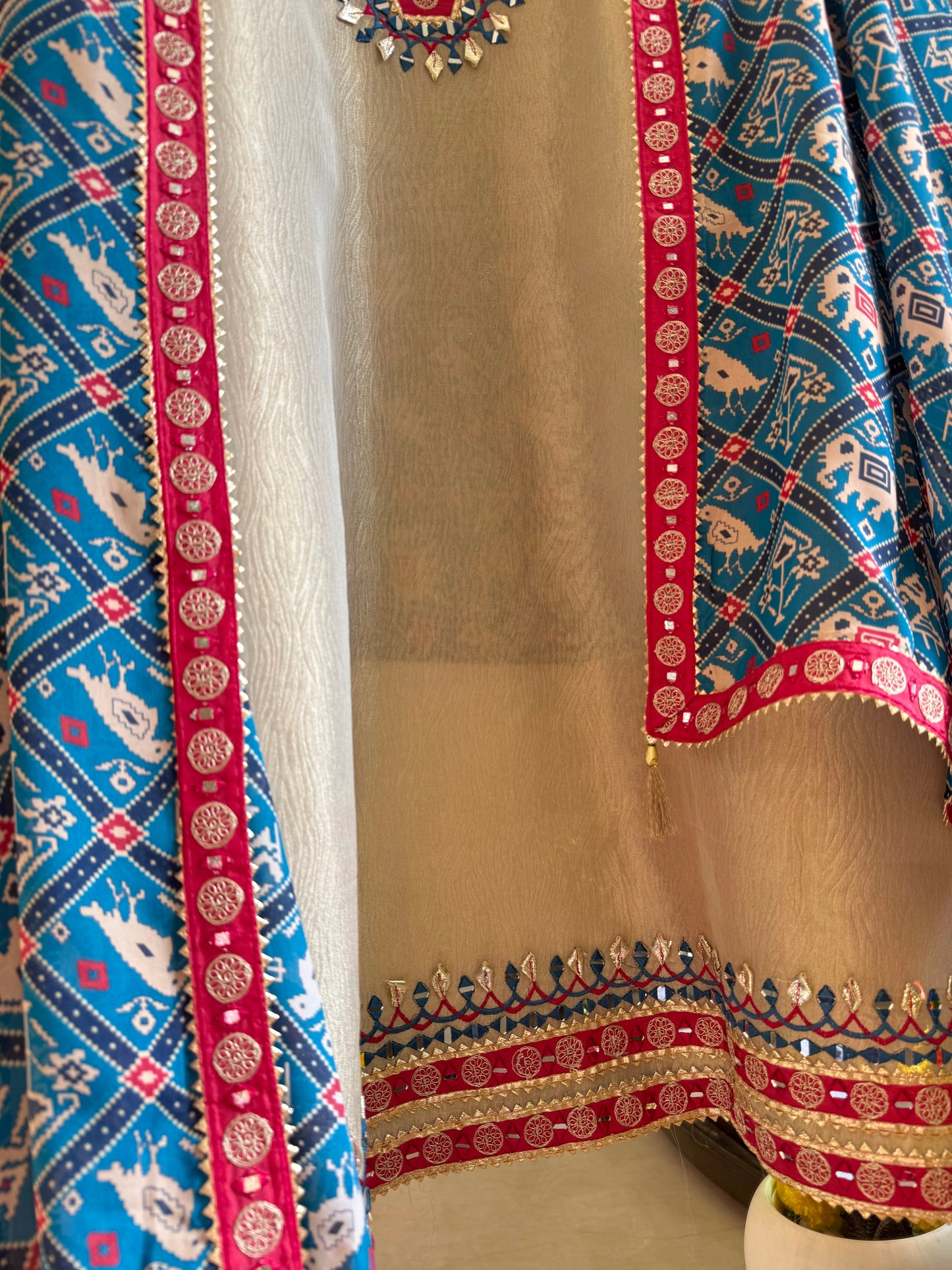Luxurious patola crush tissue silk suit