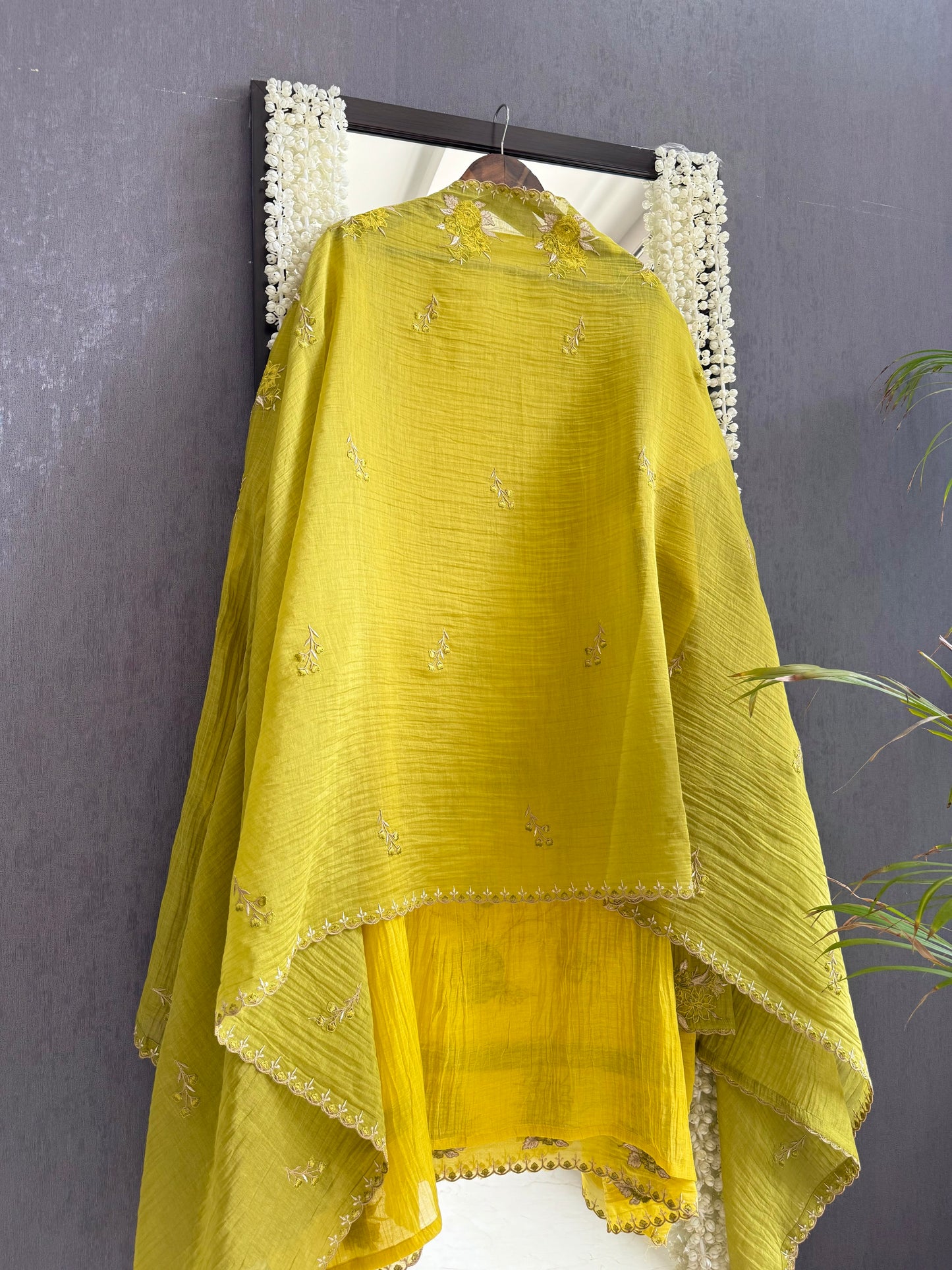 Luxurious Mul chanderi appliqué floral suit