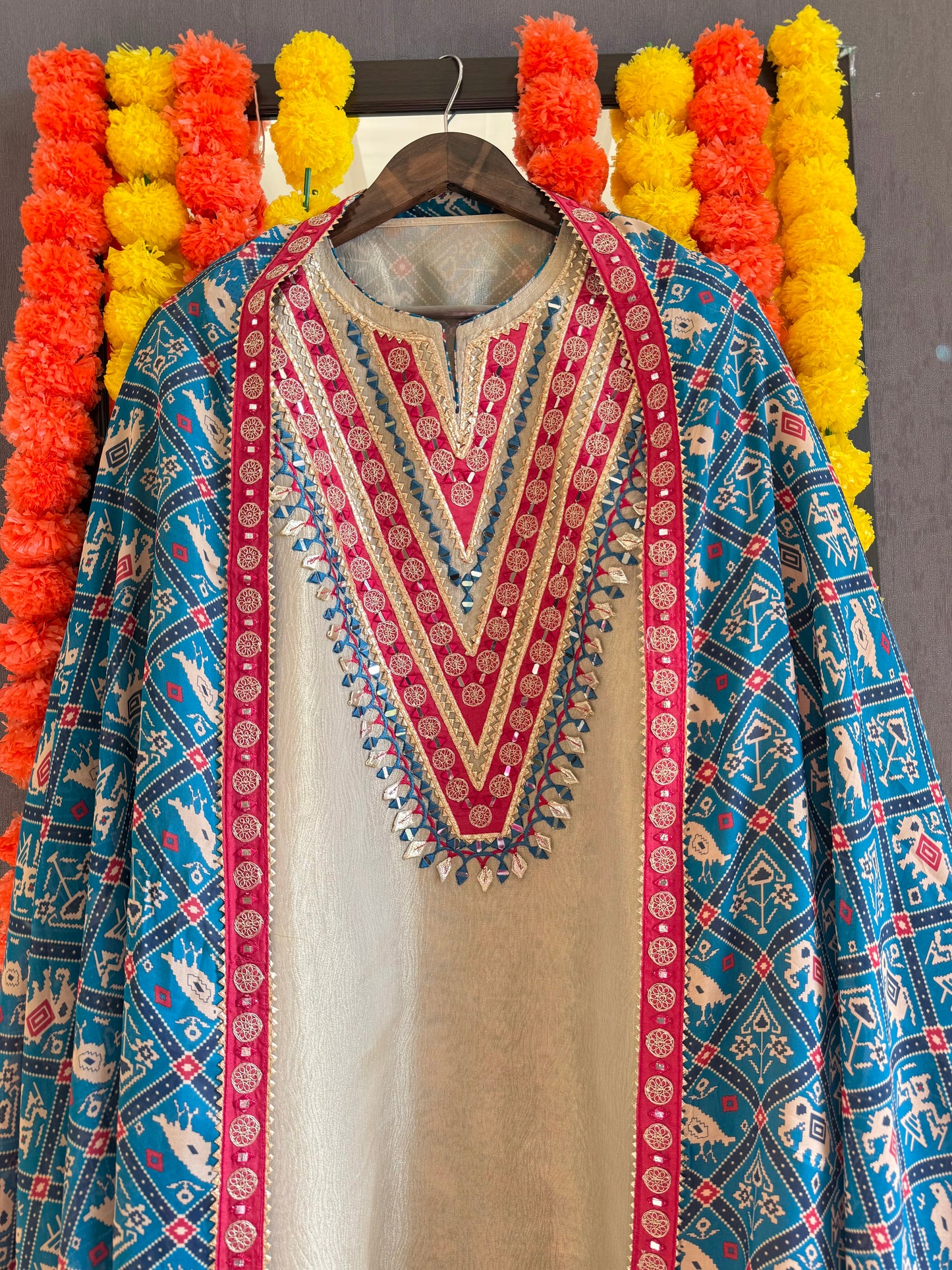 Luxurious patola crush tissue silk suit