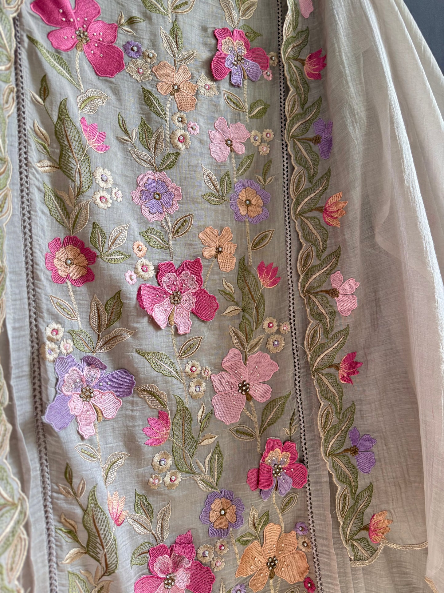 Luxurious Mul chanderi appliqué work floral suit
