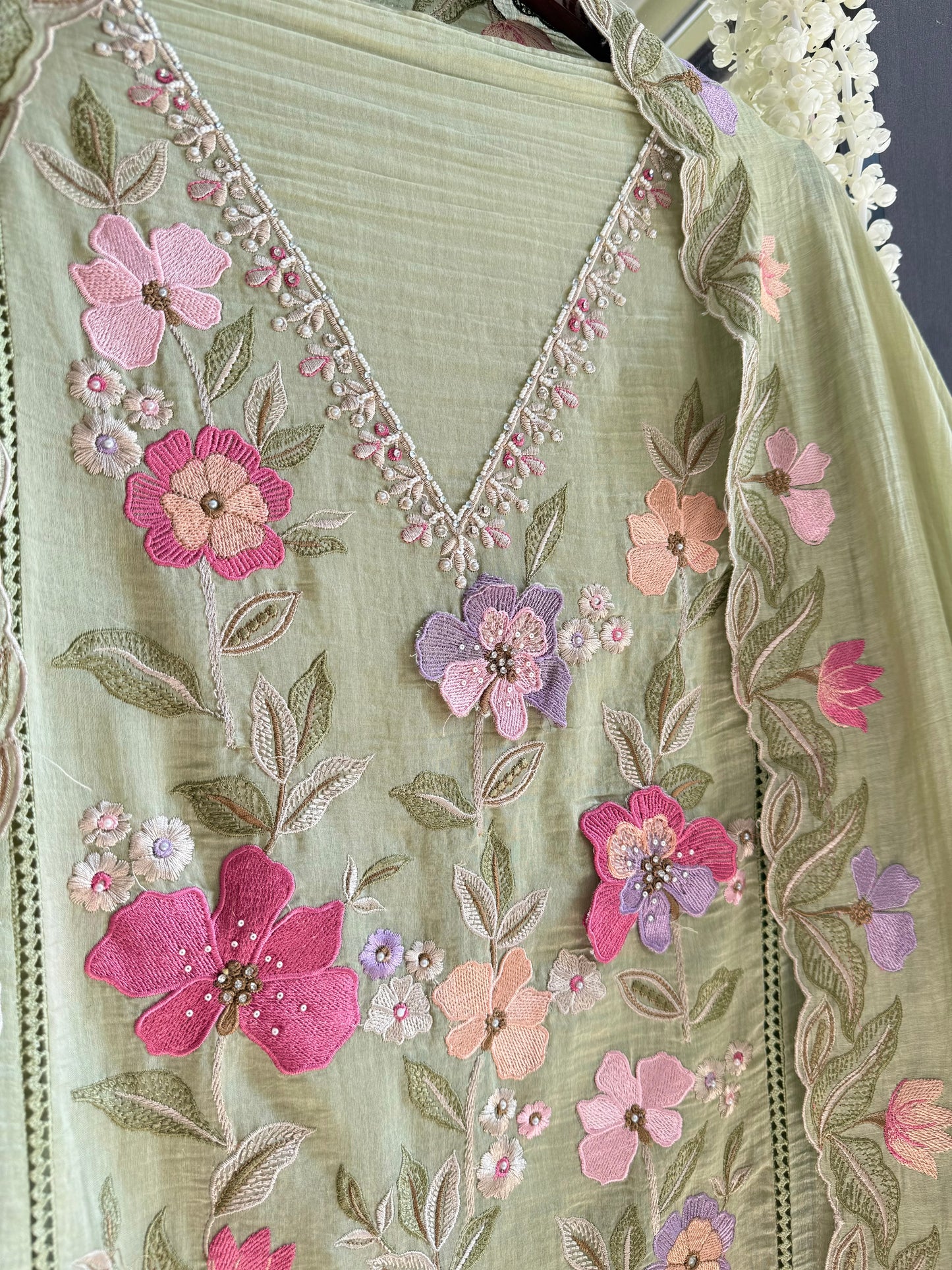 Luxurious Mul chanderi appliqué work floral suit