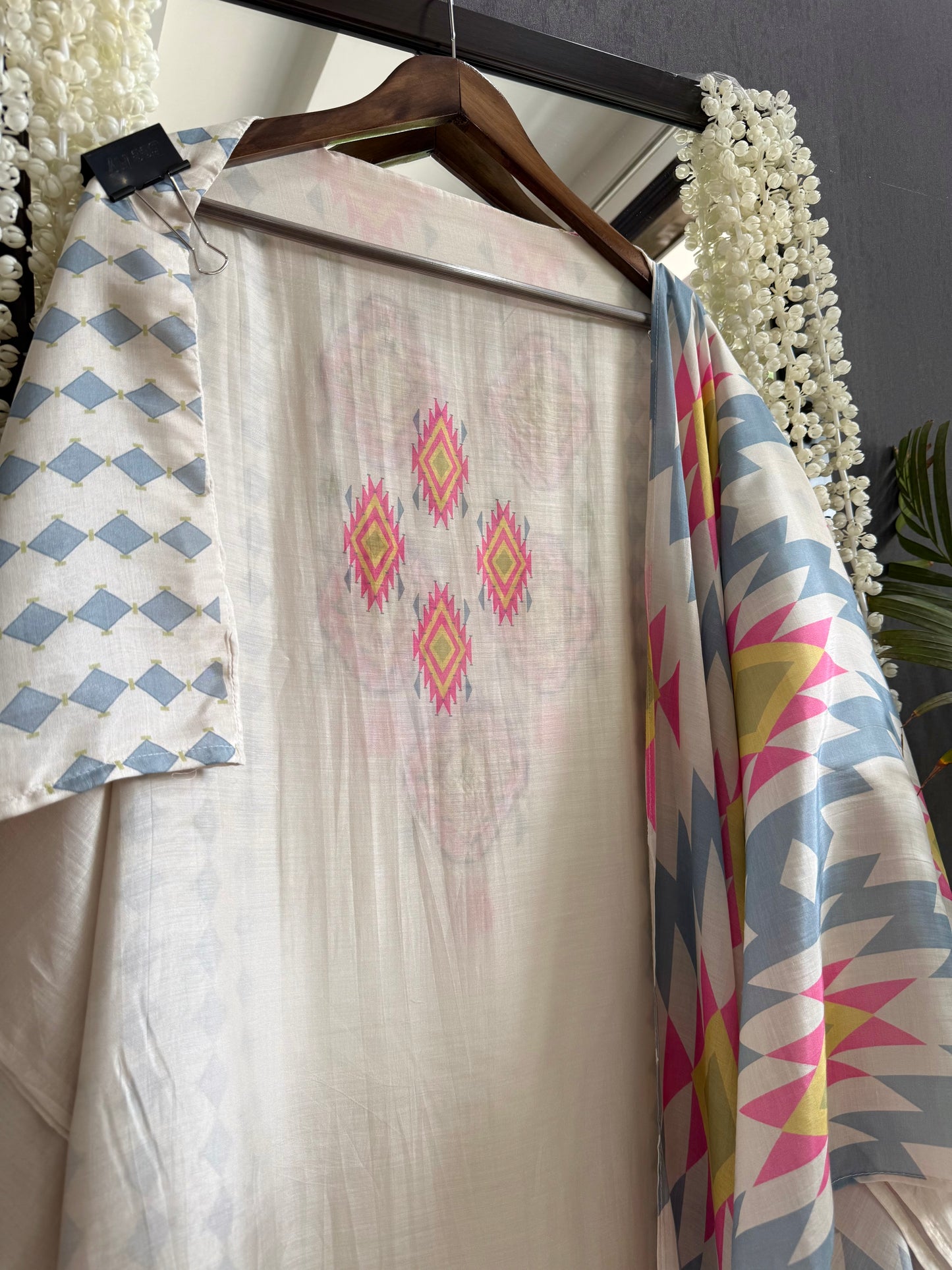 Muslin ikkat inspired handwork suits