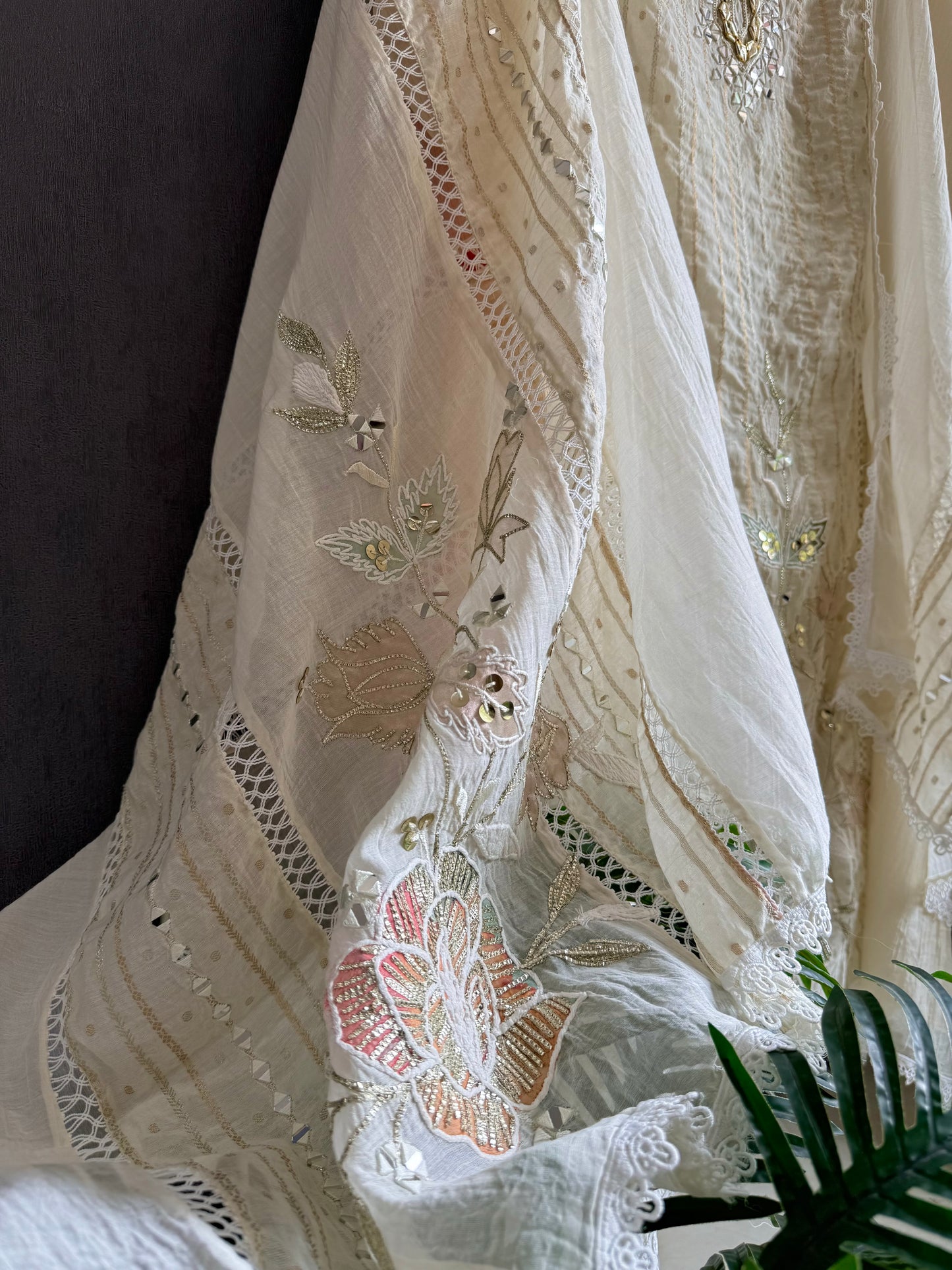 Luxurious Mul chanderi gold appliqué work suit