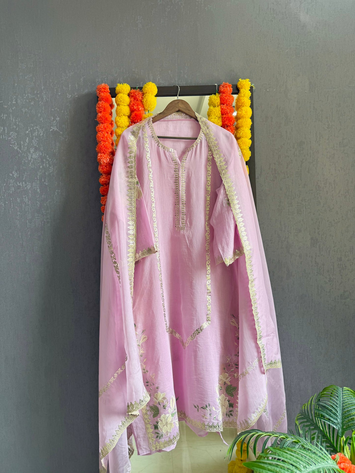 Luxurious Mul chanderi gold appliqué work suit