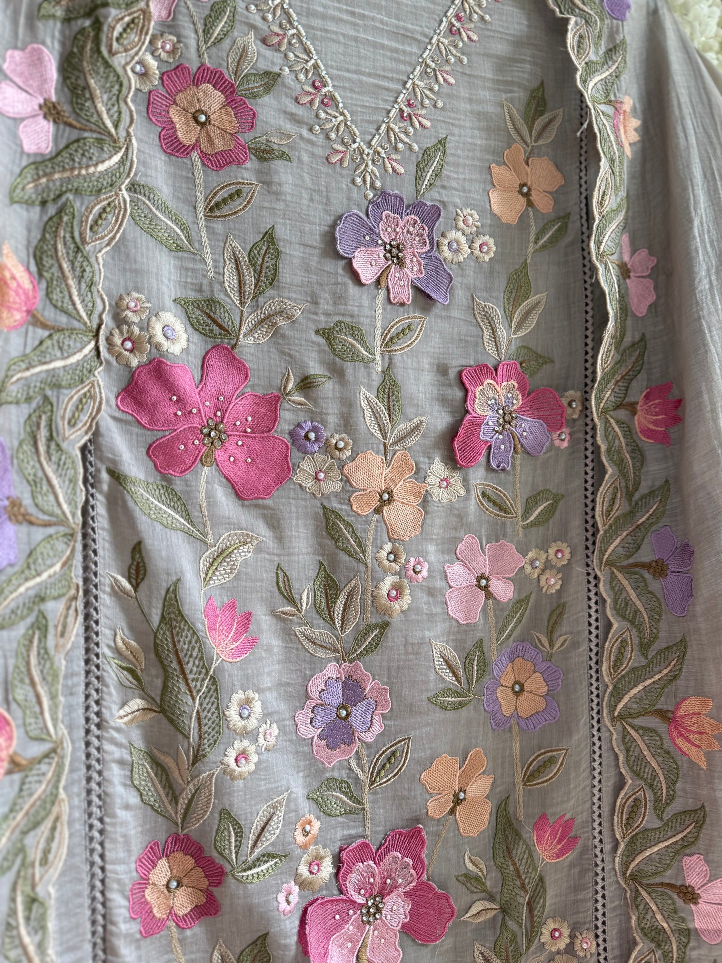 Luxurious Mul chanderi appliqué work floral suit