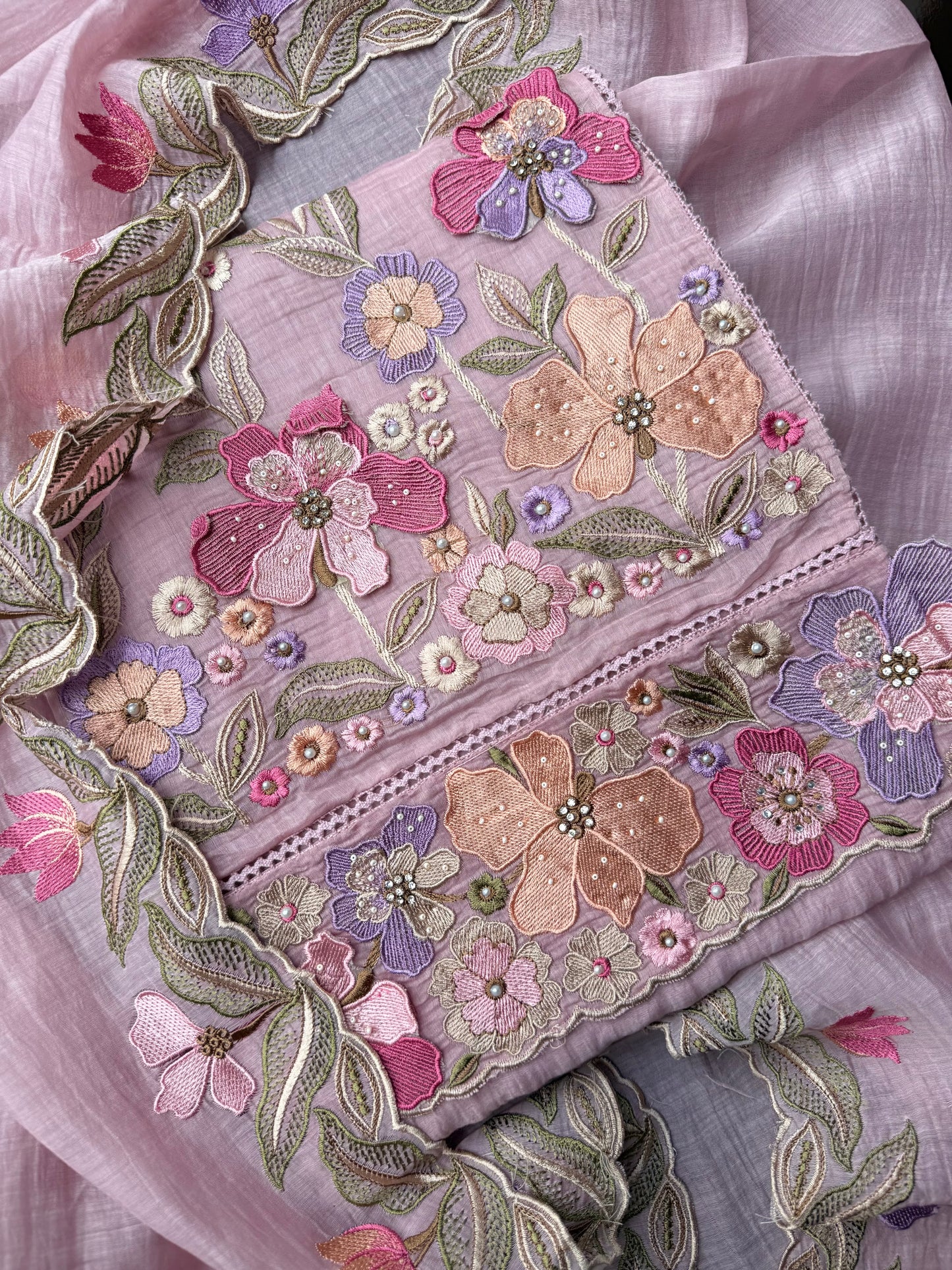 Luxurious Mul chanderi appliqué work floral suit