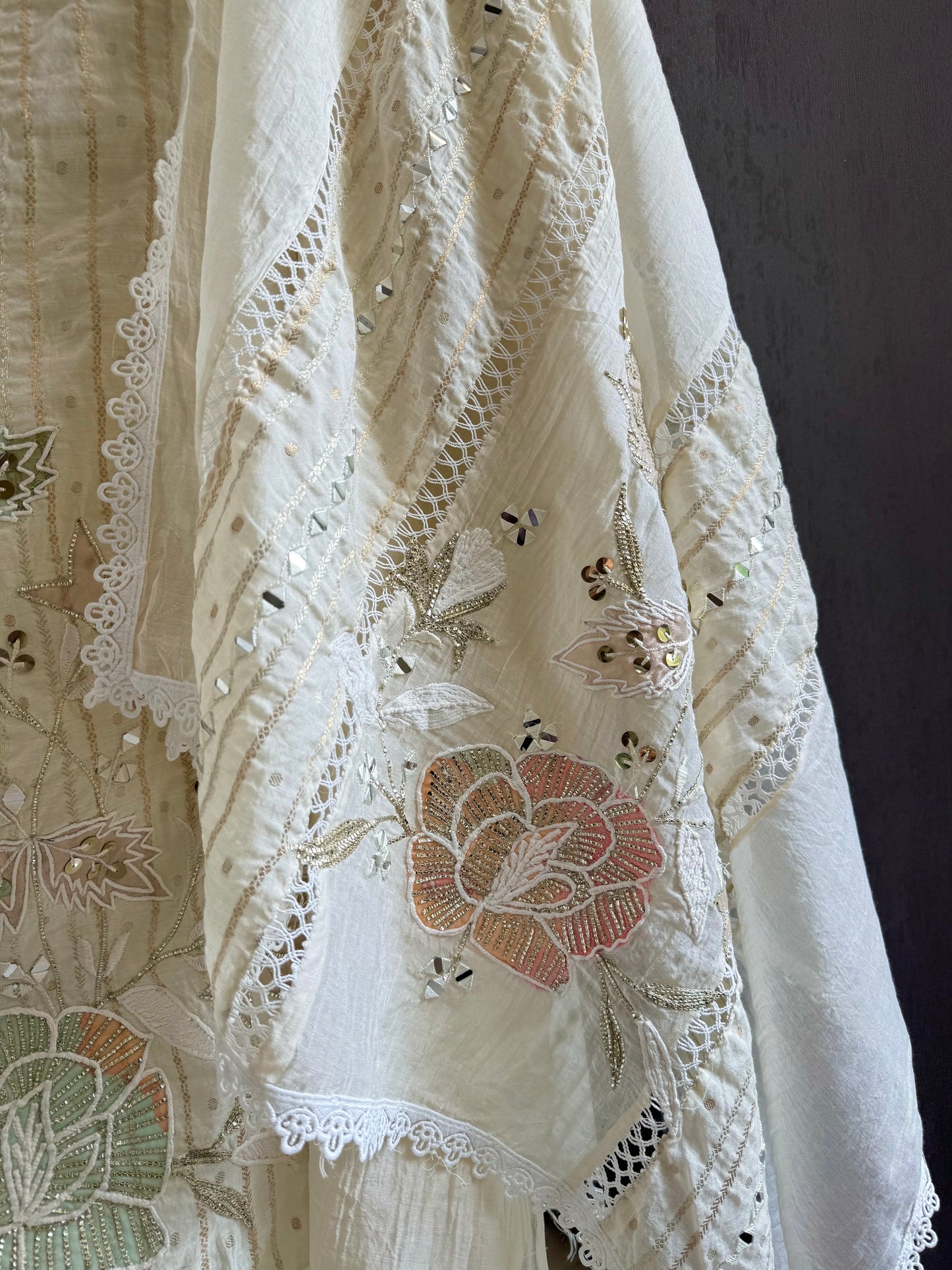 Luxurious Mul chanderi gold appliqué work suit