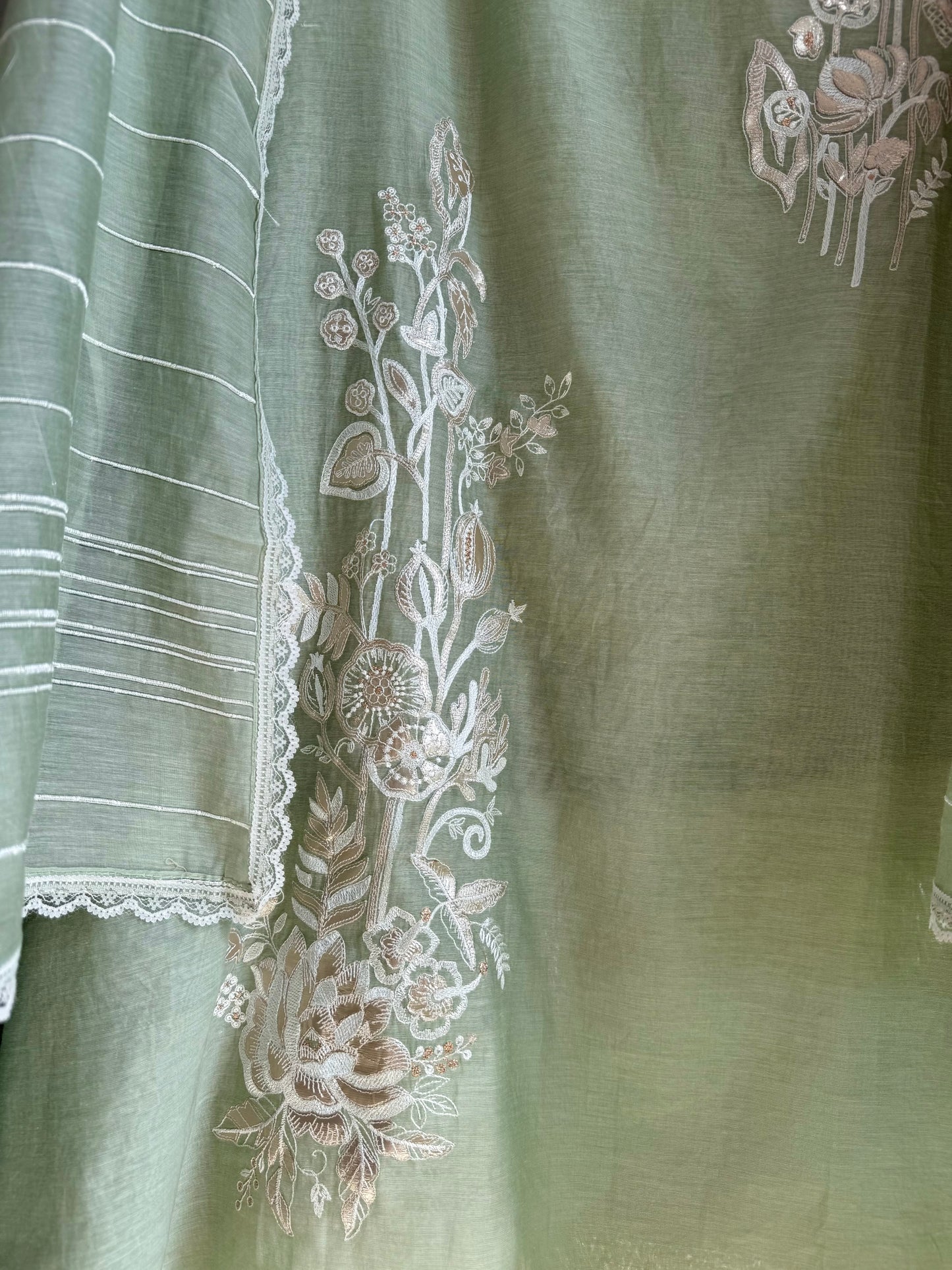 Luxurious Mul chanderi gold appliqué work suit