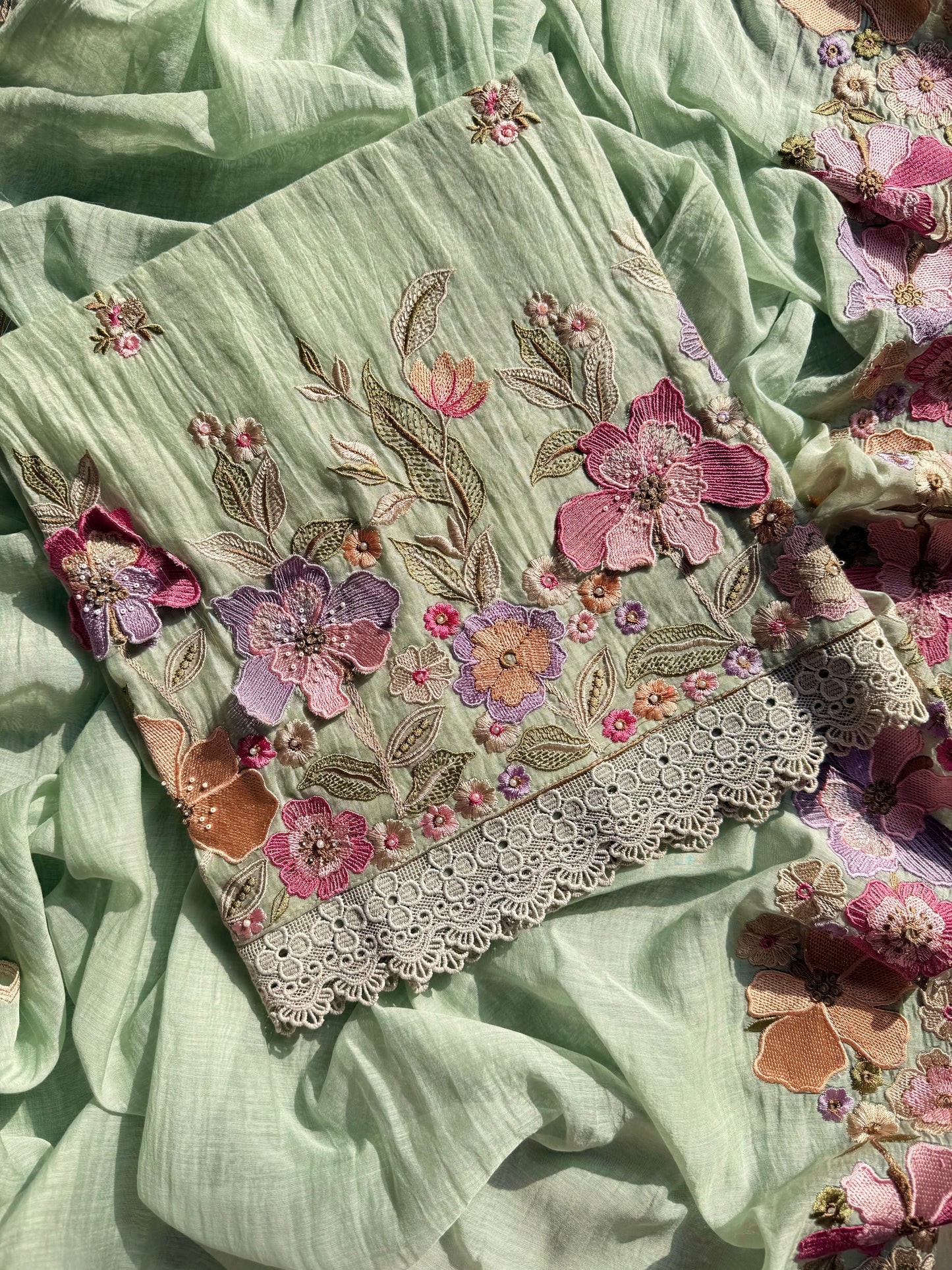 Luxurious Mul chanderi appliqué work floral suit