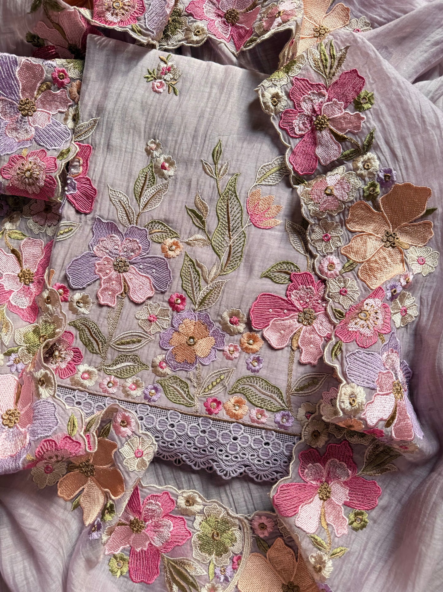 Luxurious Mul chanderi appliqué work floral suit