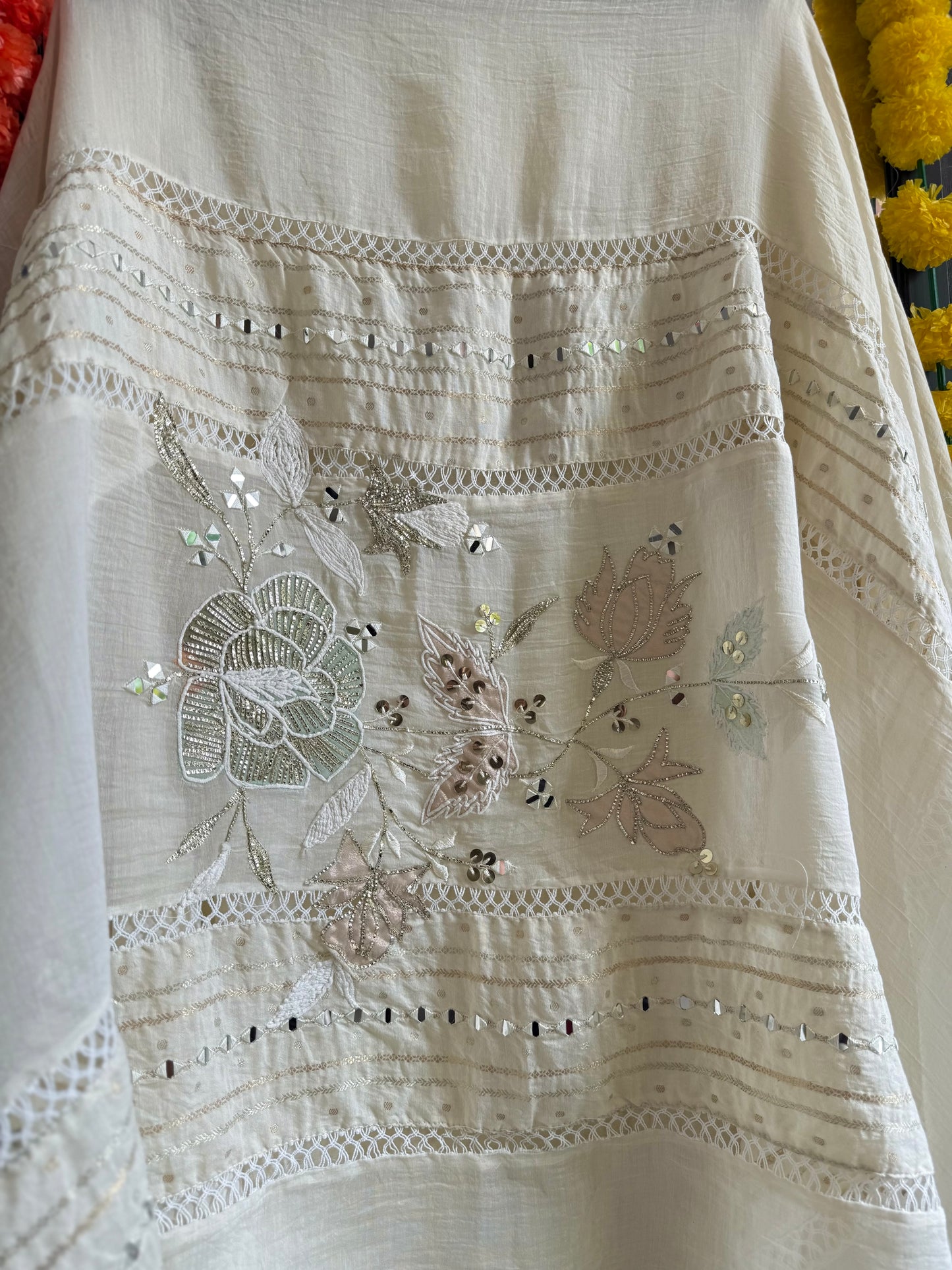 Luxurious Mul chanderi gold appliqué work suit