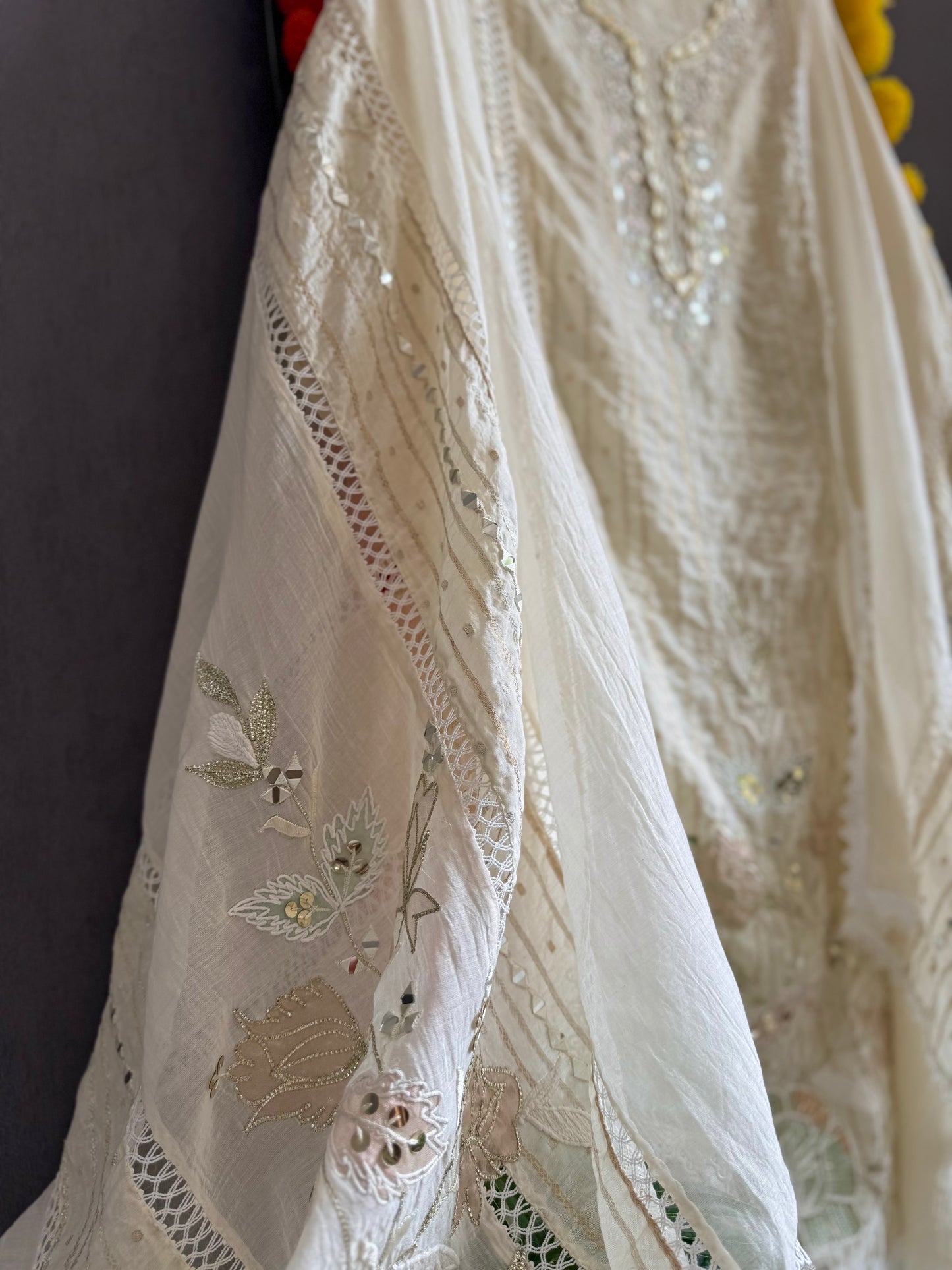 Luxurious Mul chanderi gold appliqué work suit