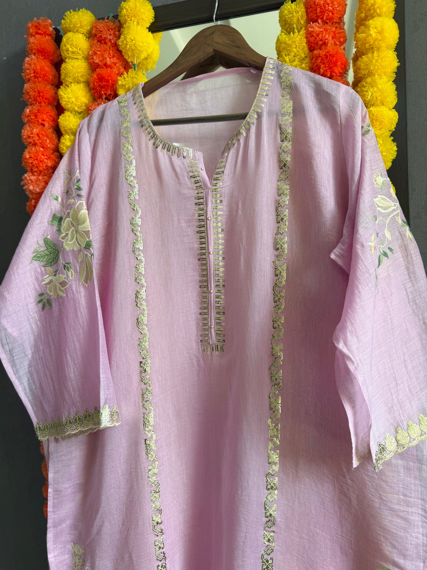 Luxurious Mul chanderi gold appliqué work suit