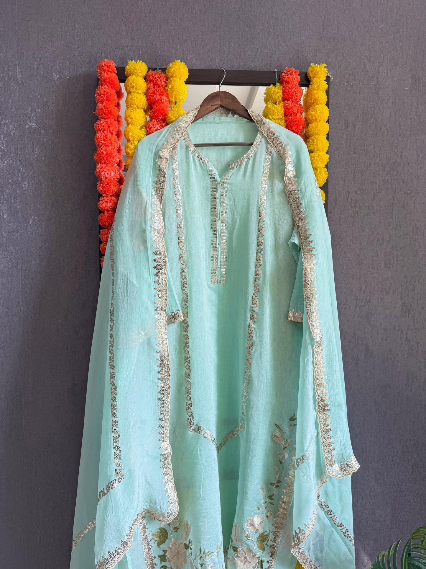 Luxurious Mul chanderi gold appliqué work suit