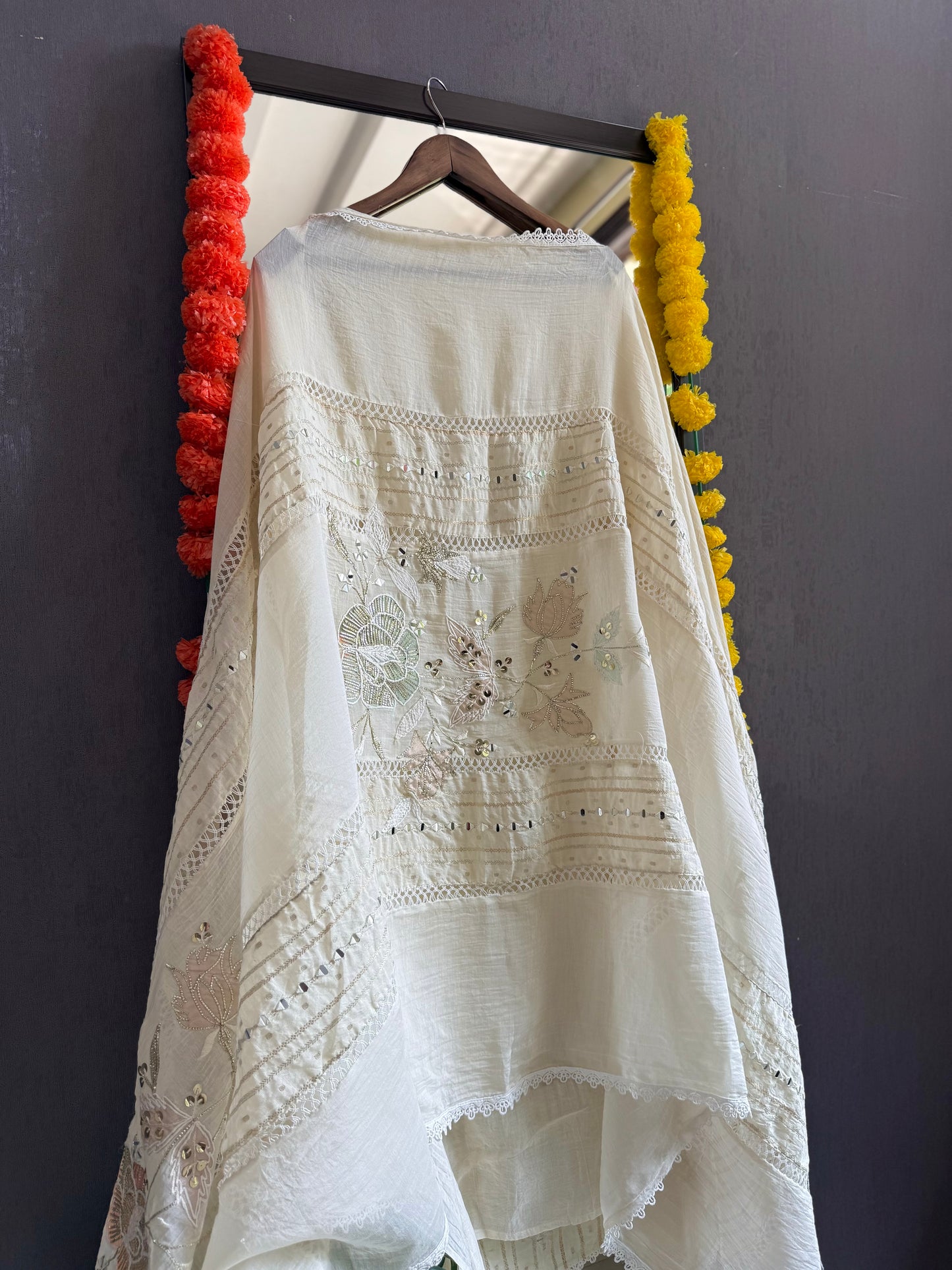 Luxurious Mul chanderi gold appliqué work suit