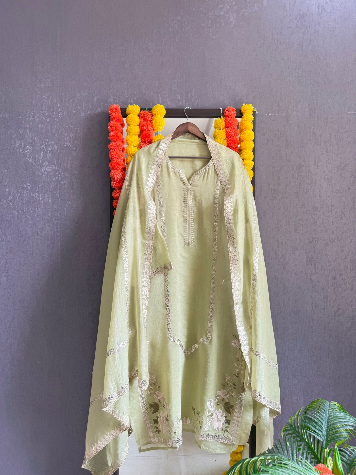Luxurious Mul chanderi gold appliqué work suit