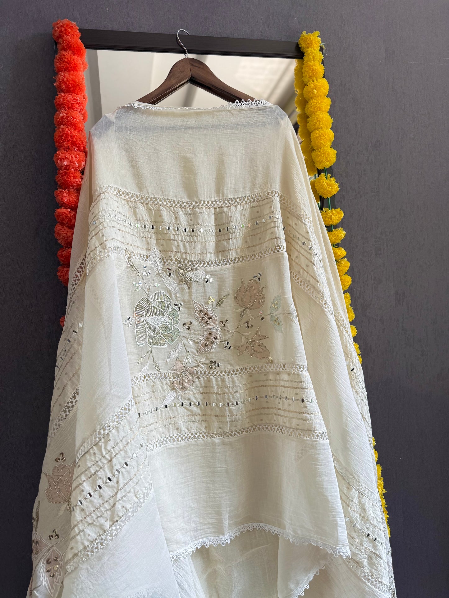 Luxurious Mul chanderi gold appliqué work suit