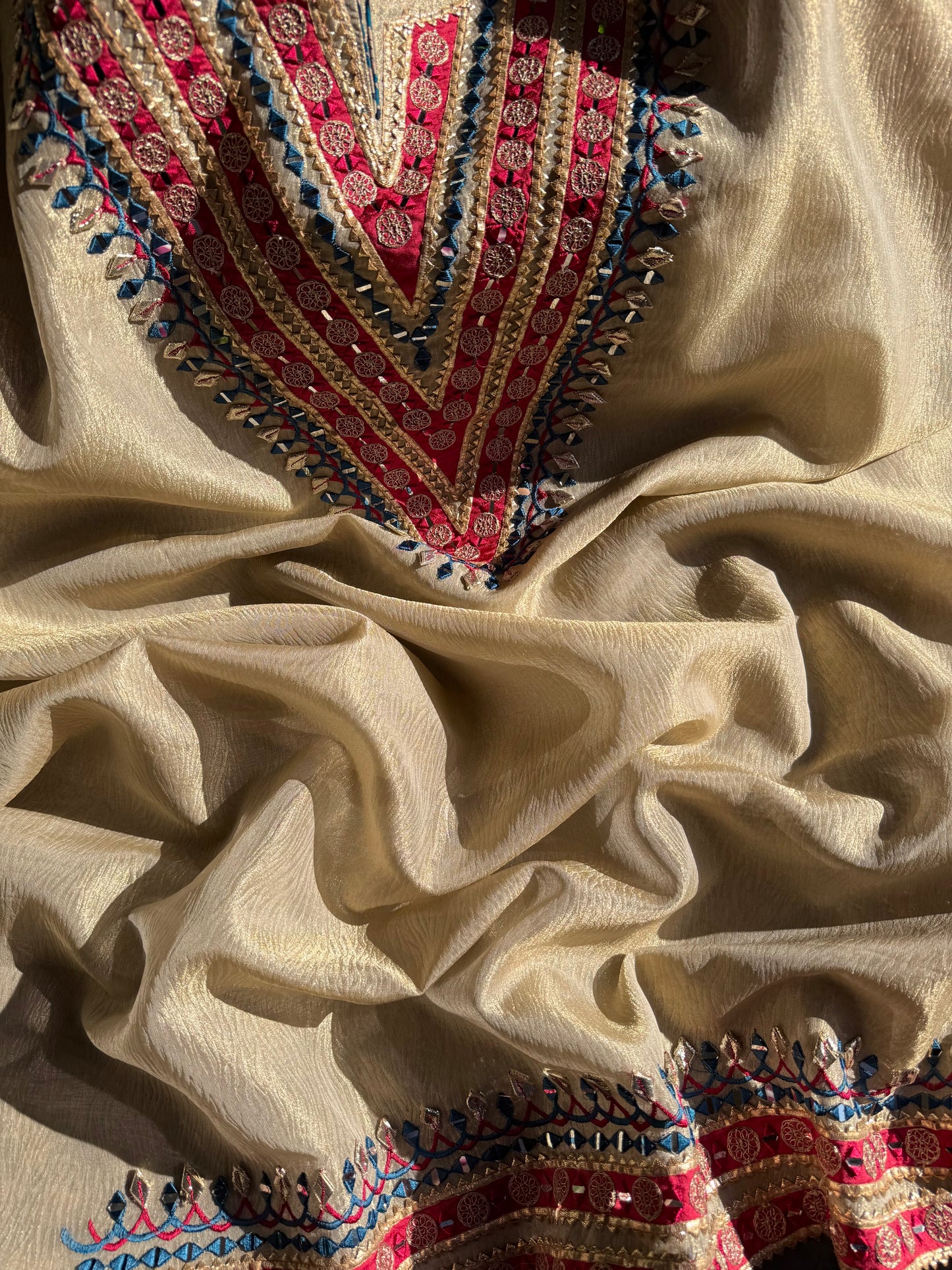 Luxurious patola crush tissue silk suit