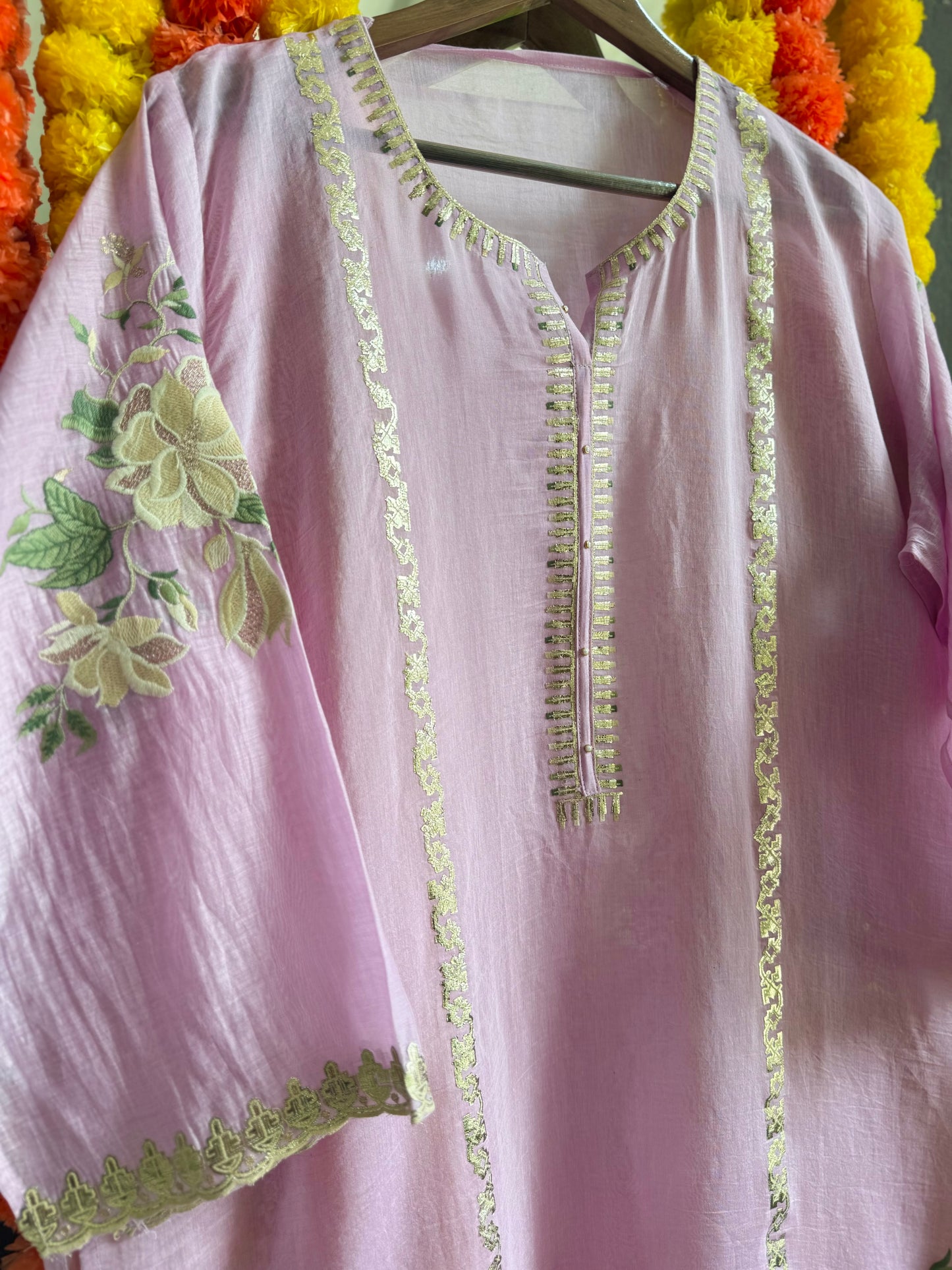 Luxurious Mul chanderi gold appliqué work suit