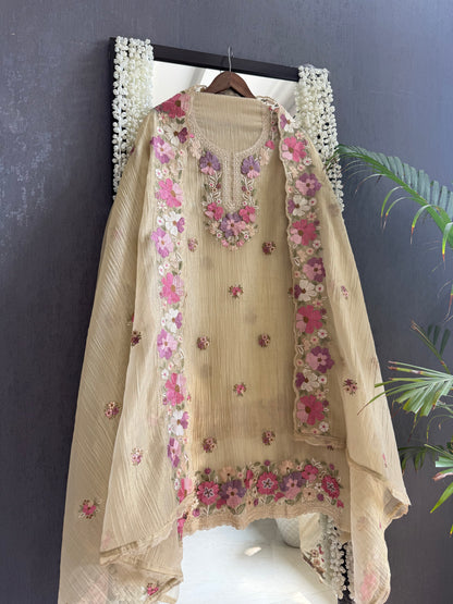 Luxurious Mul chanderi appliqué work floral suit