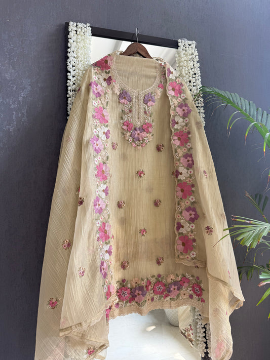 Luxurious Mul chanderi appliqué work floral suit