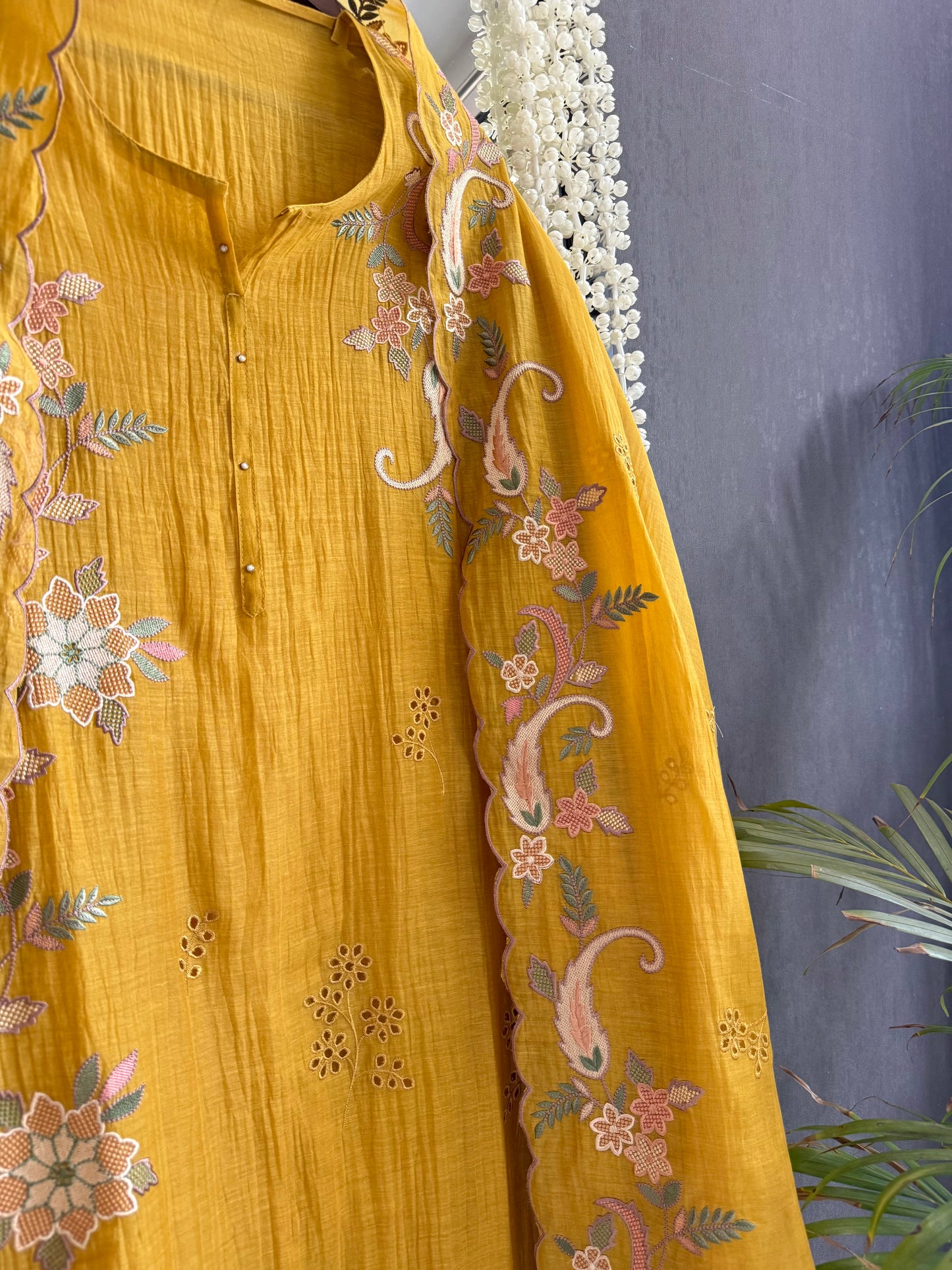 Luxurious Mul chanderi threadwork schiffili suit